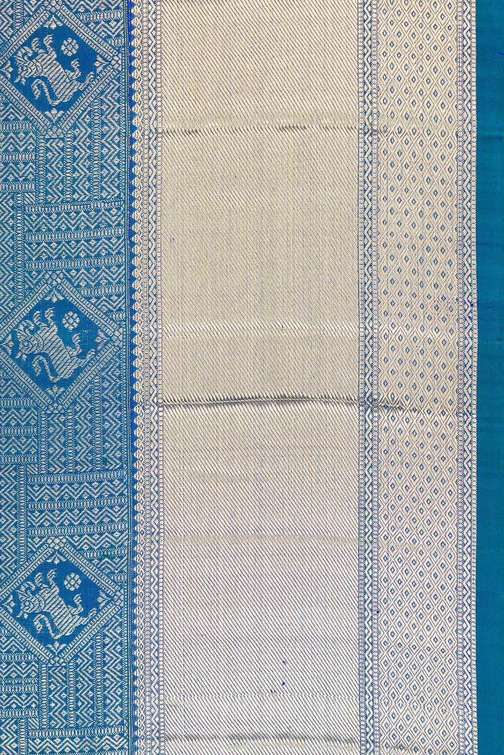 Border image of Peacock Blue Dual Tone Kanchipuram Silk Saree with Zari Brocade on the body and Zari Border. 