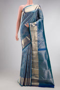 Peacock Blue Dual Tone Kanchipuram Silk Saree with Zari Brocade on the body and Zari Border.  displayed on a mannequin