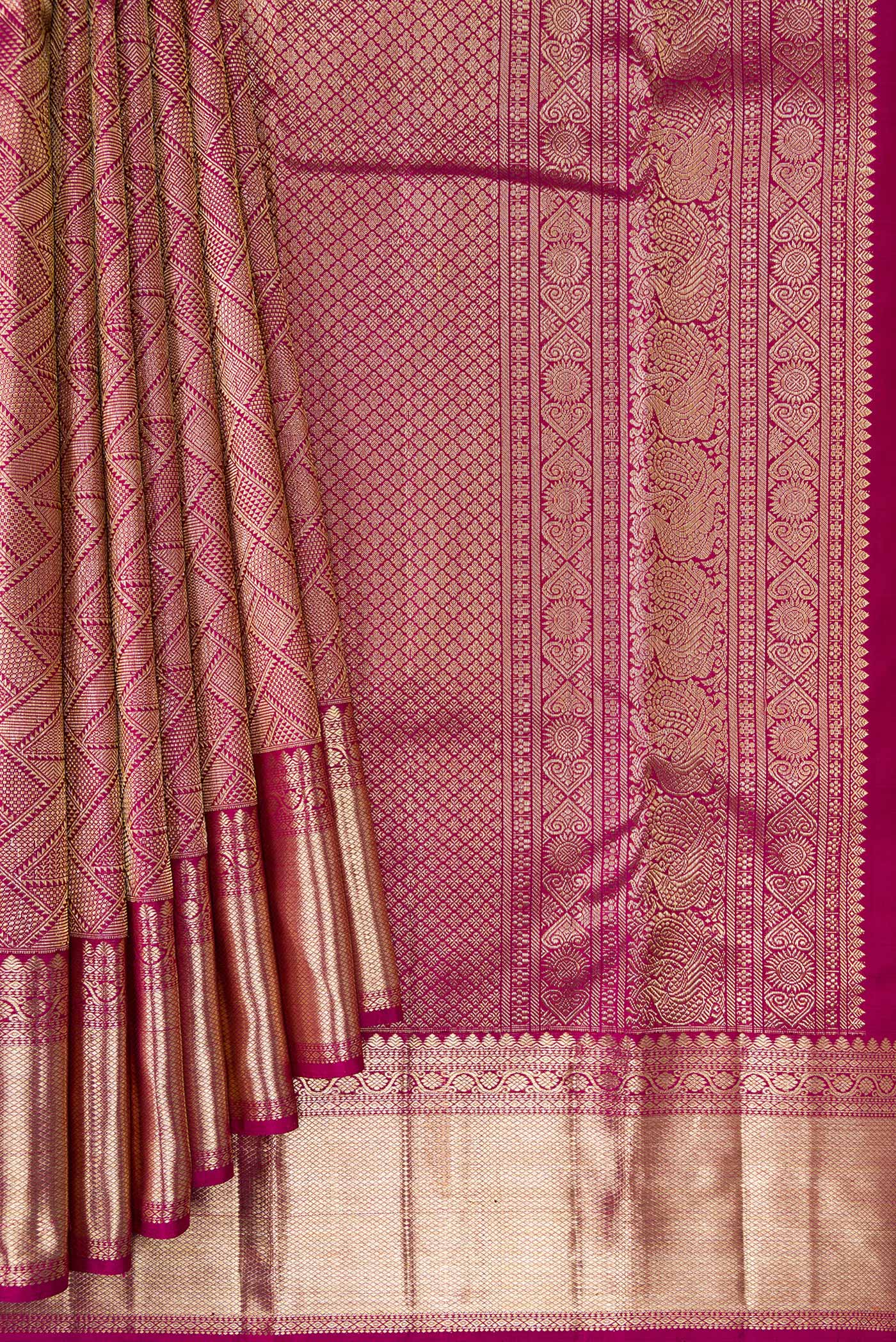 Pleats and pallu of Magenta Dual Tone Kanchipuram Silk Saree with Zari Brocade on the body and Zari Border. 