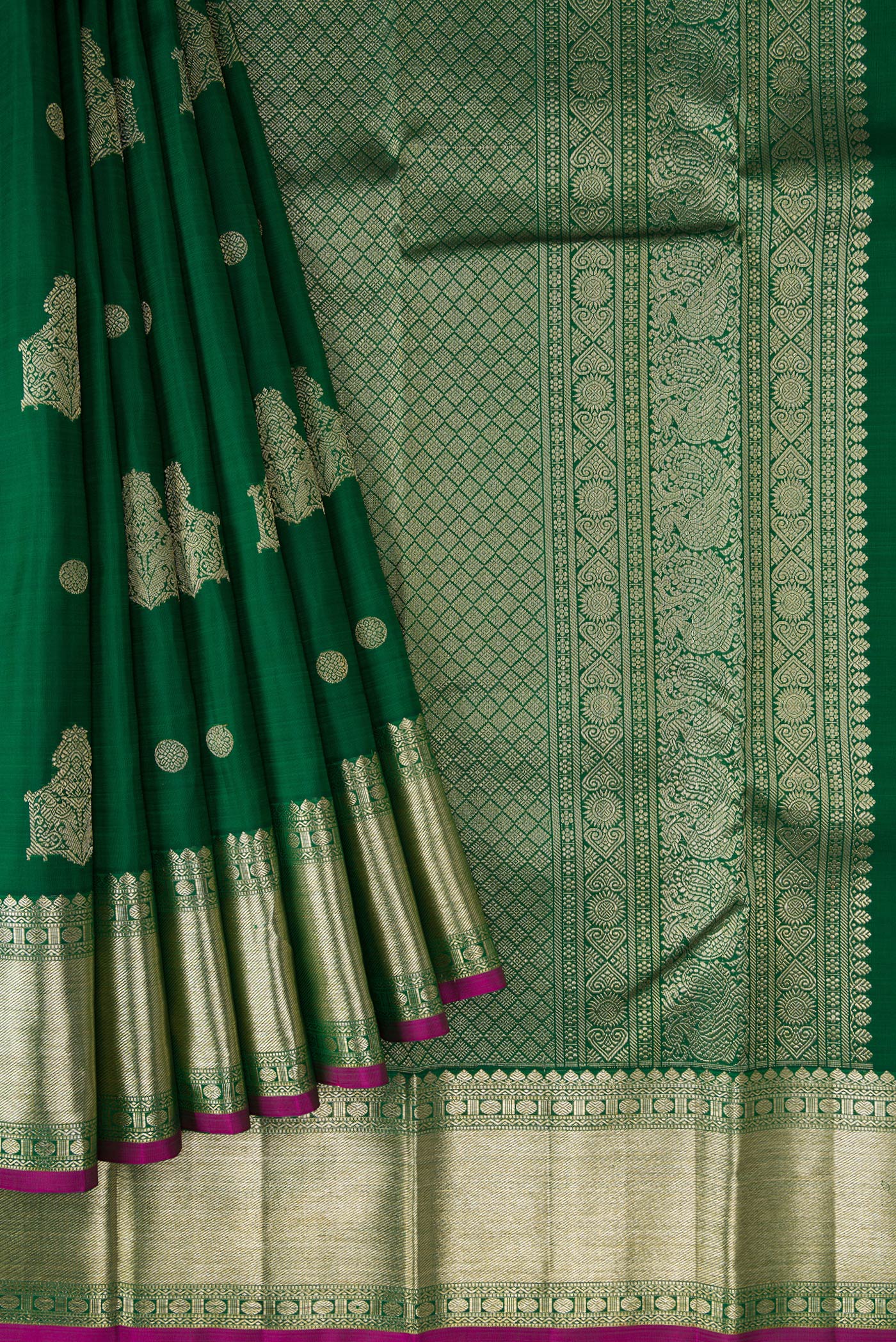 Pleats and pallu of Green Dual Tone Kanjivaram Silk Saree with Zari Butta on the body and Zari Border. 