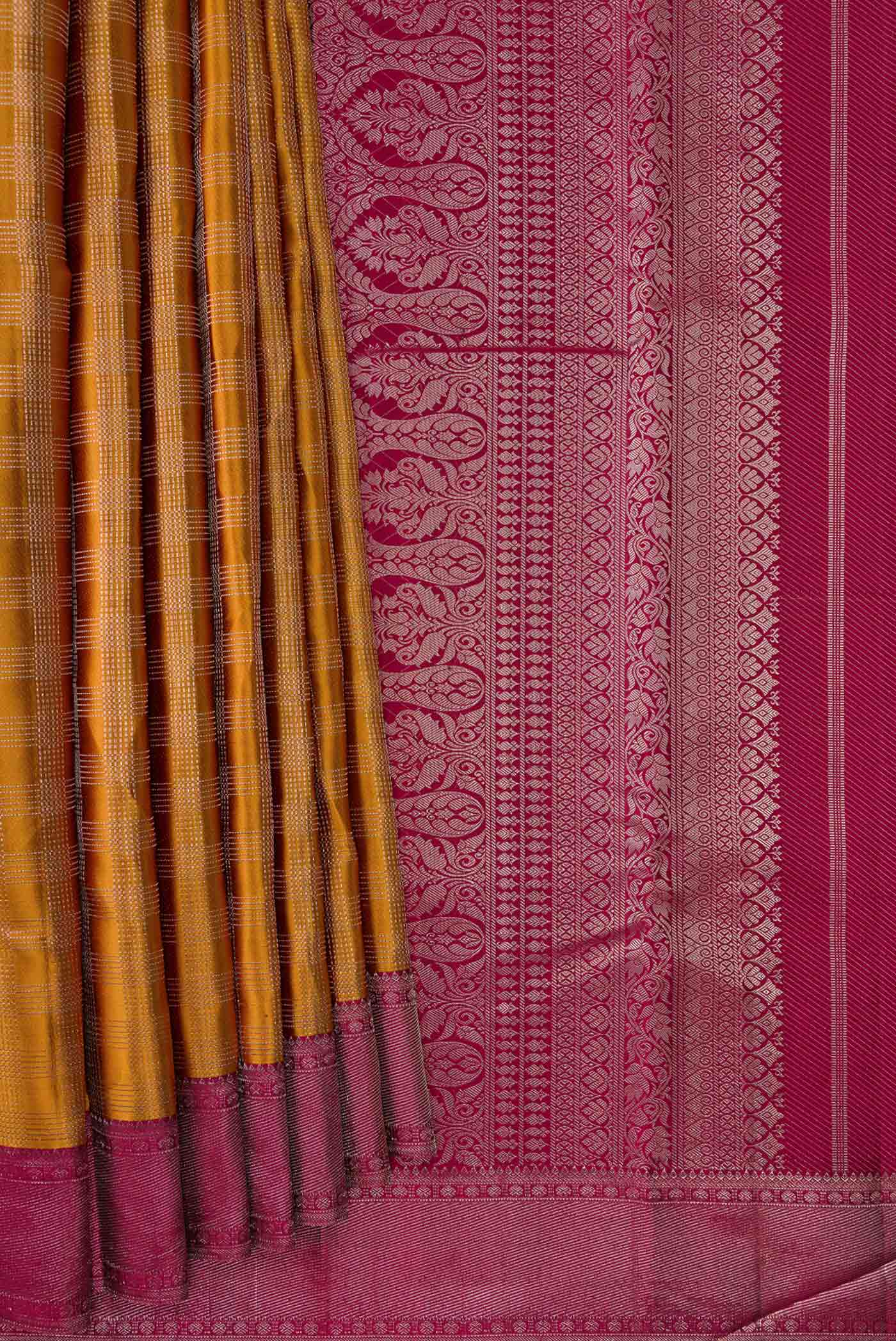 Pleats and pallu of Mustard Dual Tone Kanchipuram Silk Saree with Zari Brocade on the body and Zari Border