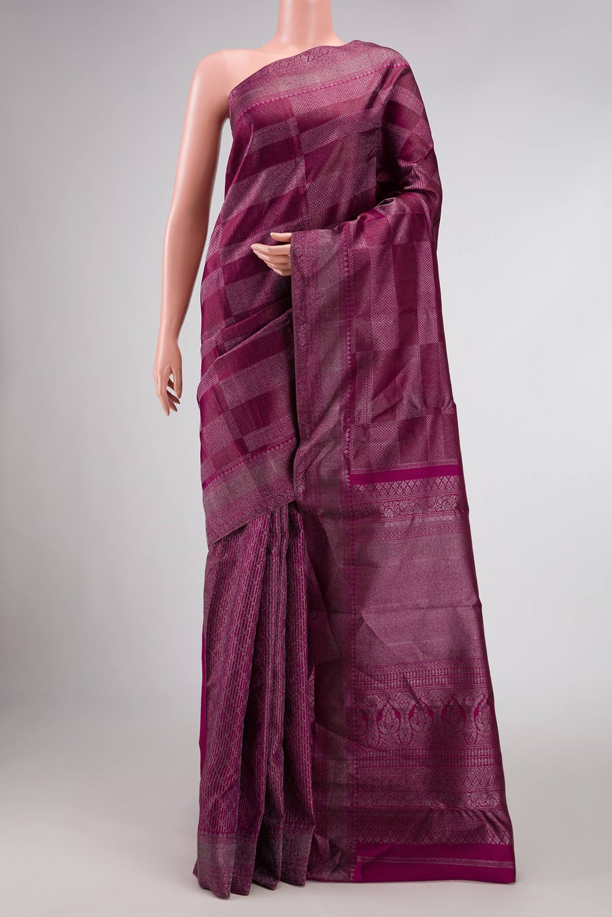 Magenta Dual Tone Kanchipuram Silk Saree with Zari Brocade on the body and Zari Border displayed on a mannequin