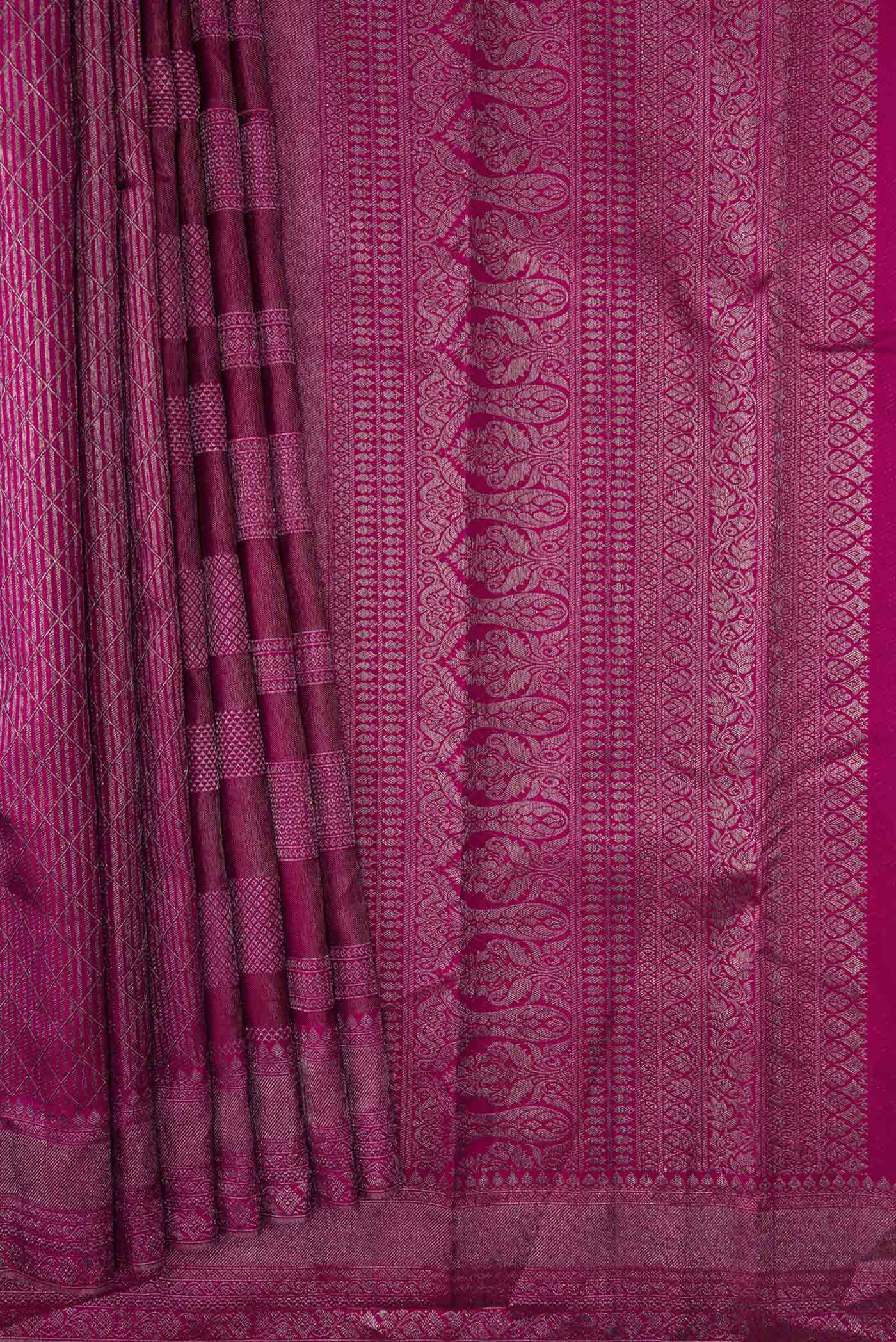 Pleats and pallu of Magenta Dual Tone Kanchipuram Silk Saree with Zari Brocade on the body and Zari Border