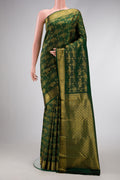 Green Dual Tone Kanjivaram Silk Saree with Zari Brocade on the body and Zari Border.  displayed on a mannequin