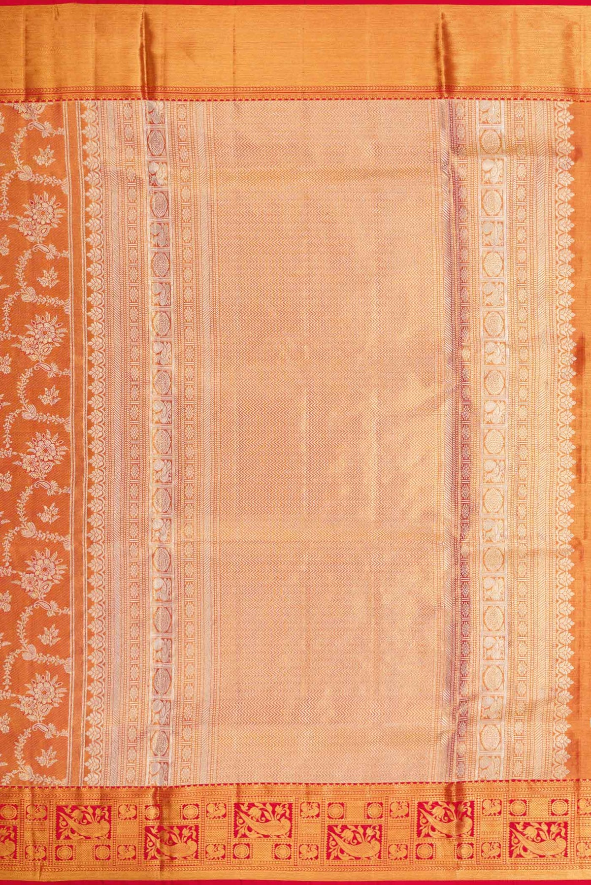 Close up image of the pallu of Red Dual Tone Kanchipuram Tissue Silk Saree with Zari Brocade on the body and Zari Border