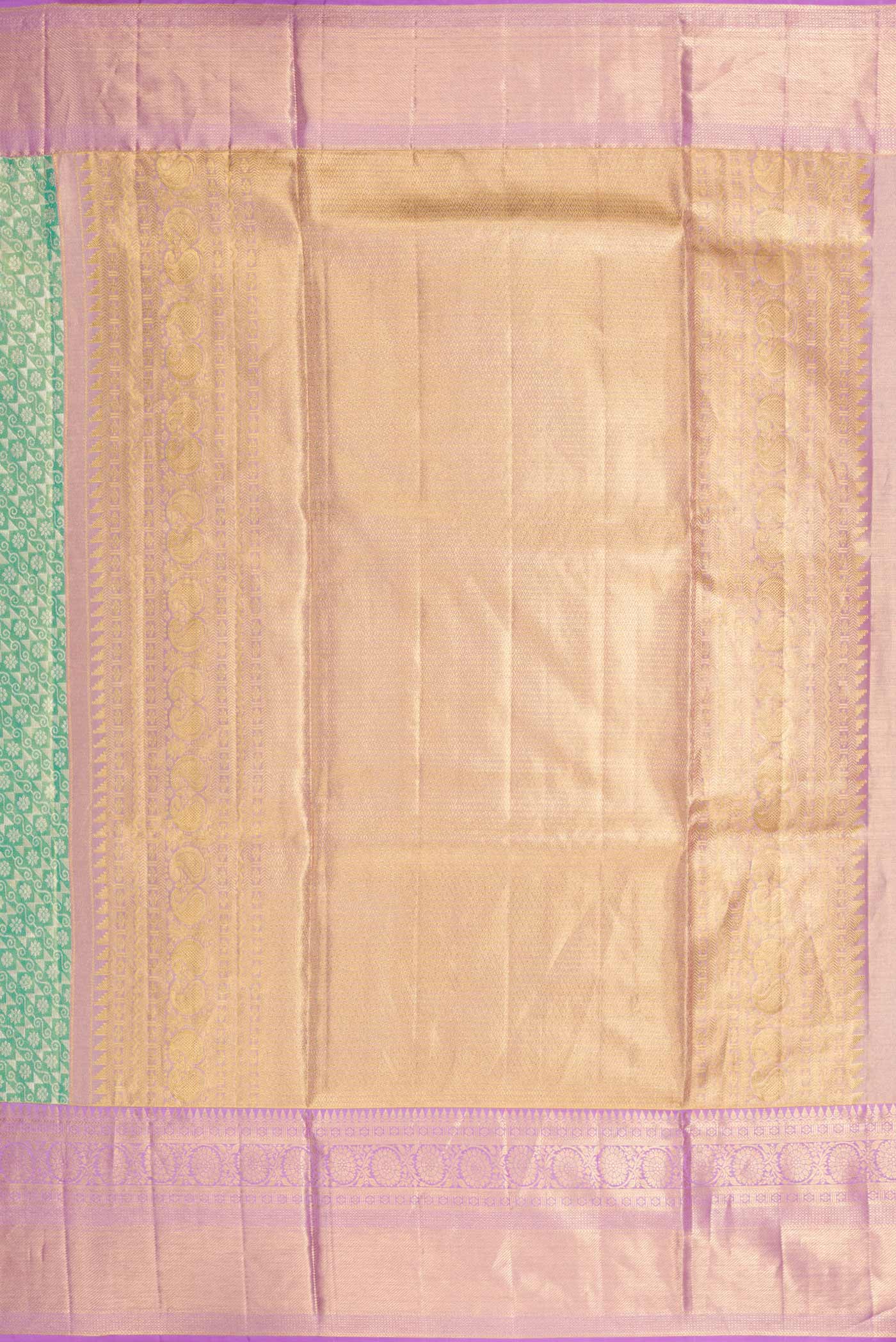 Close up image of the pallu of Green Dual Tone Kanchipuram Tissue Silk Saree with Zari Brocade on the body and Zari Border