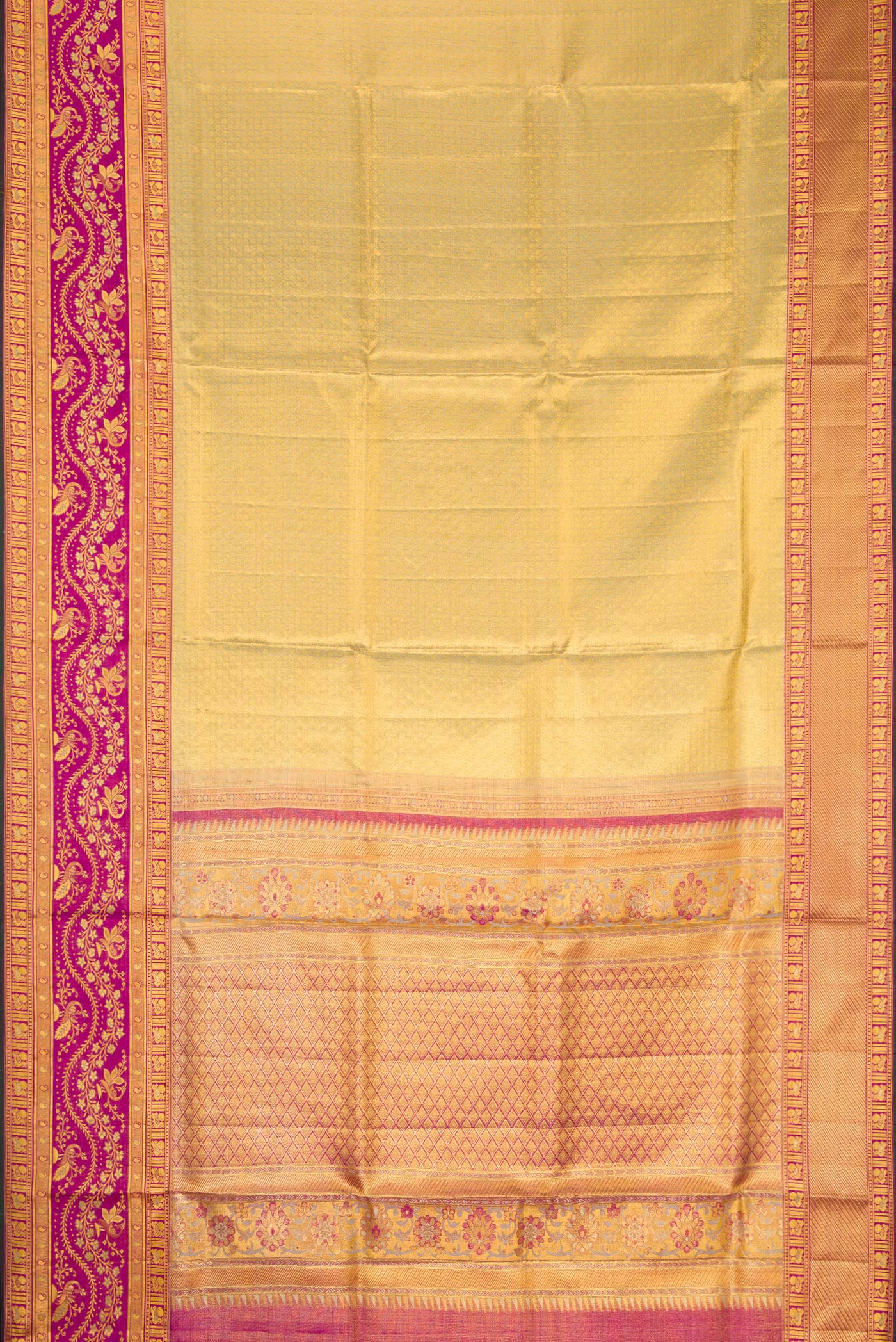 Flat view of Gold Dual Tone Kanchipuram Tissue Silk Saree with Zari Brocade on the body and Zari Border. 