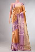 Orange Kanchipuram Tissue Silk Saree with Zari Brocade on the body and Zari Border displayed on a mannequin