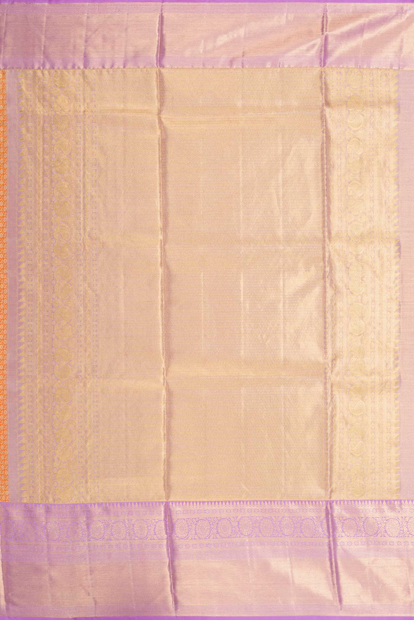 Close up image of the pallu of Orange Kanchipuram Tissue Silk Saree with Zari Brocade on the body and Zari Border
