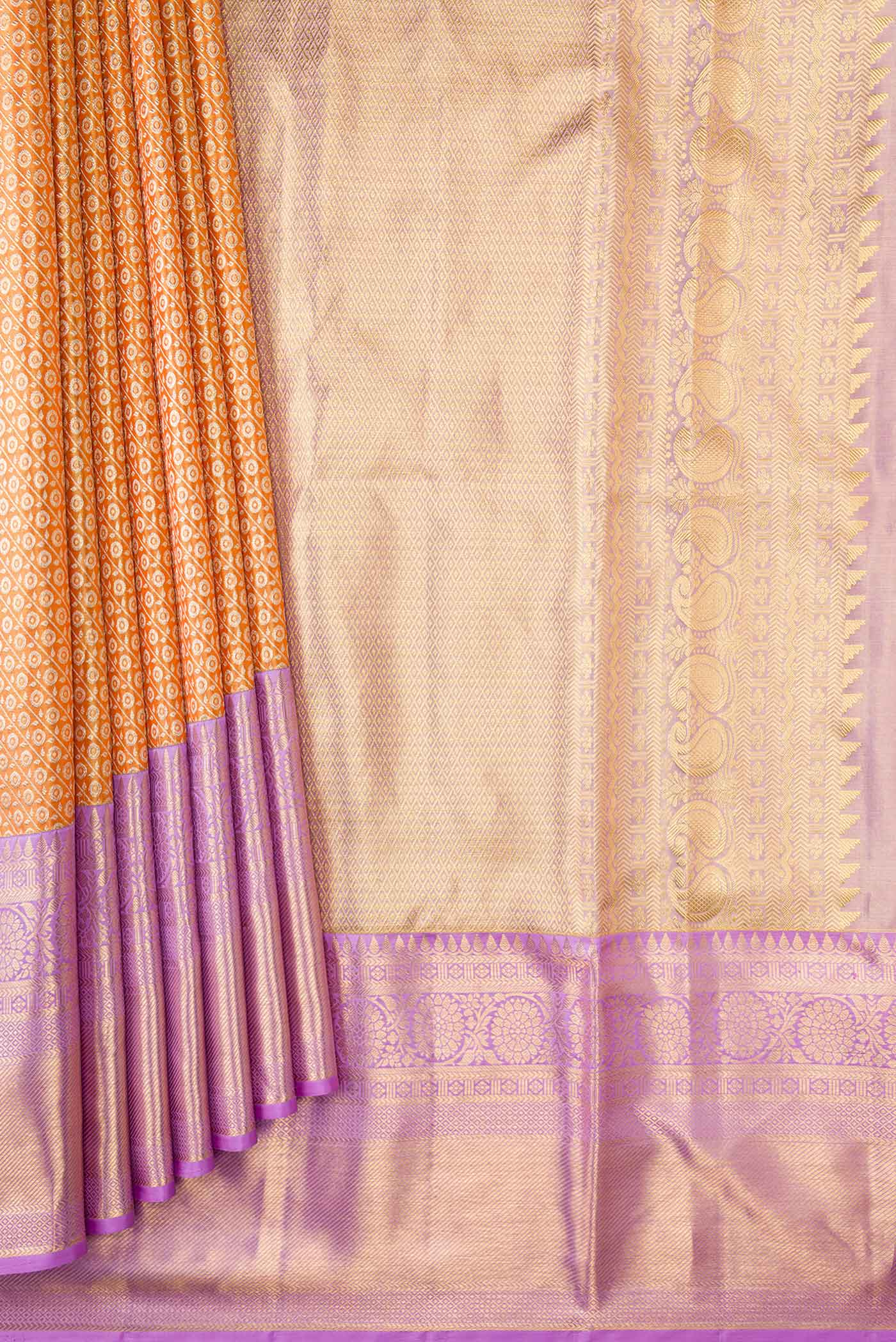 Pleats and pallu of Orange Kanchipuram Tissue Silk Saree with Zari Brocade on the body and Zari Border
