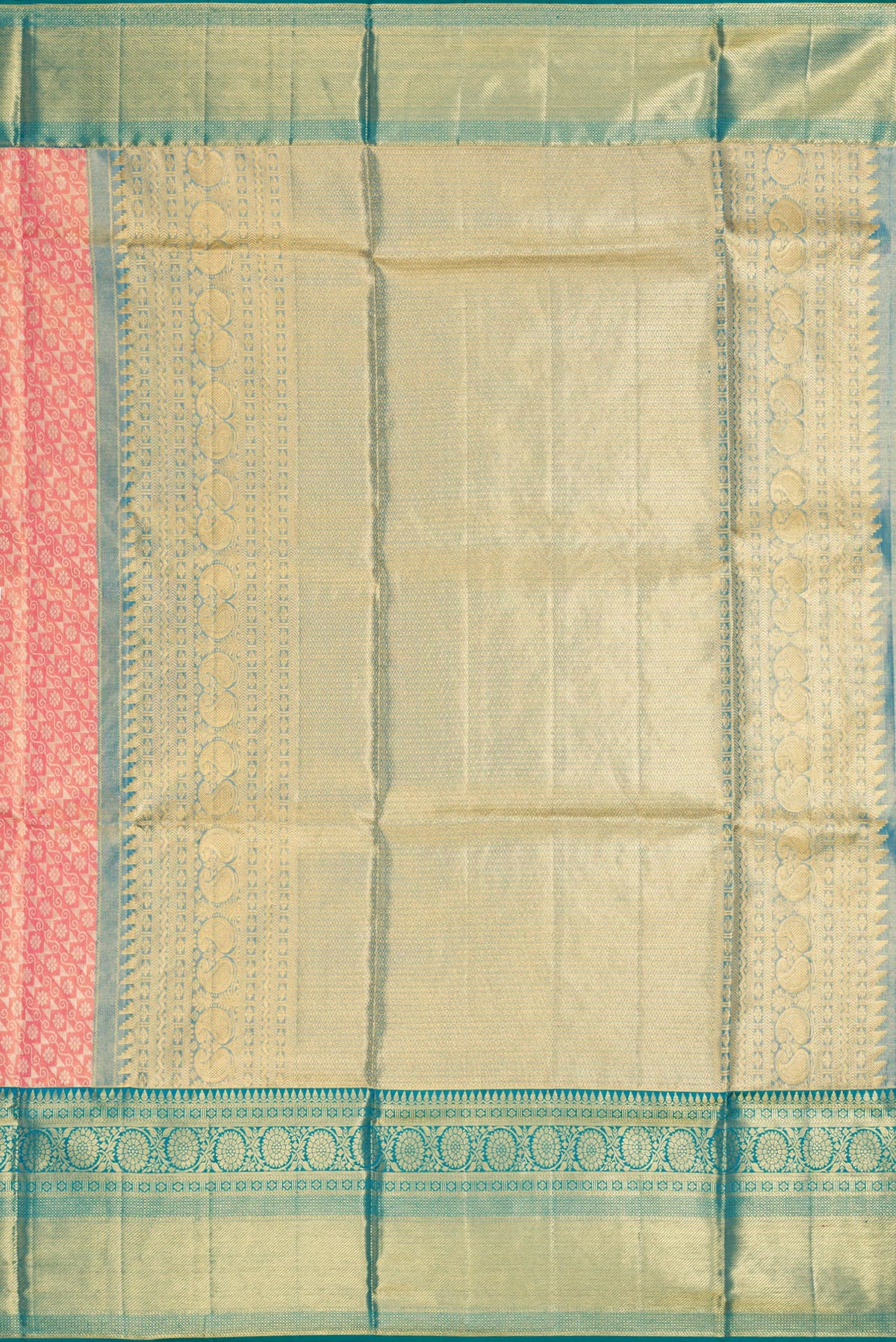 Close up image of the pallu of Golden Peach Dual Tone Kanchipuram Tissue Silk Saree with Zari Brocade on the body and Zari Border. 