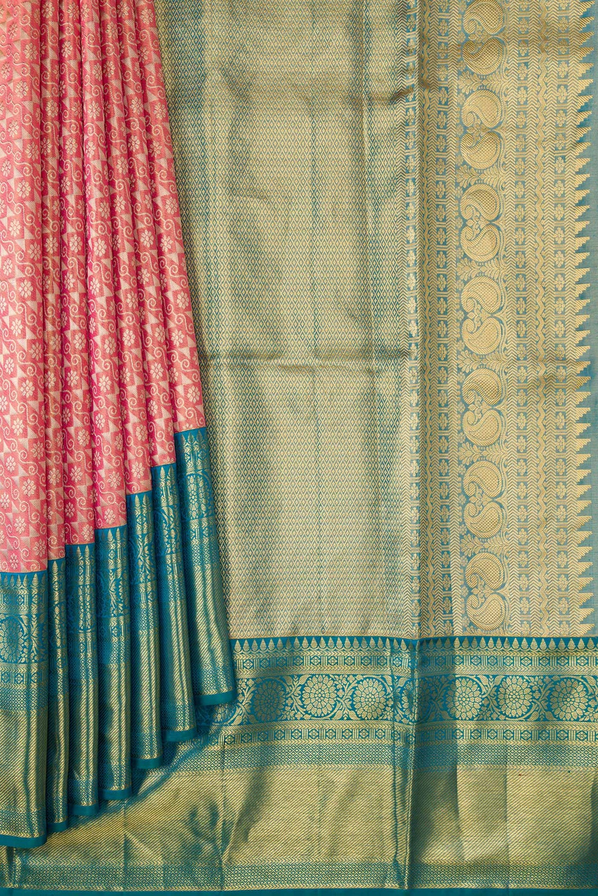 Pleats and pallu of Golden Peach Dual Tone Kanchipuram Tissue Silk Saree with Zari Brocade on the body and Zari Border. 