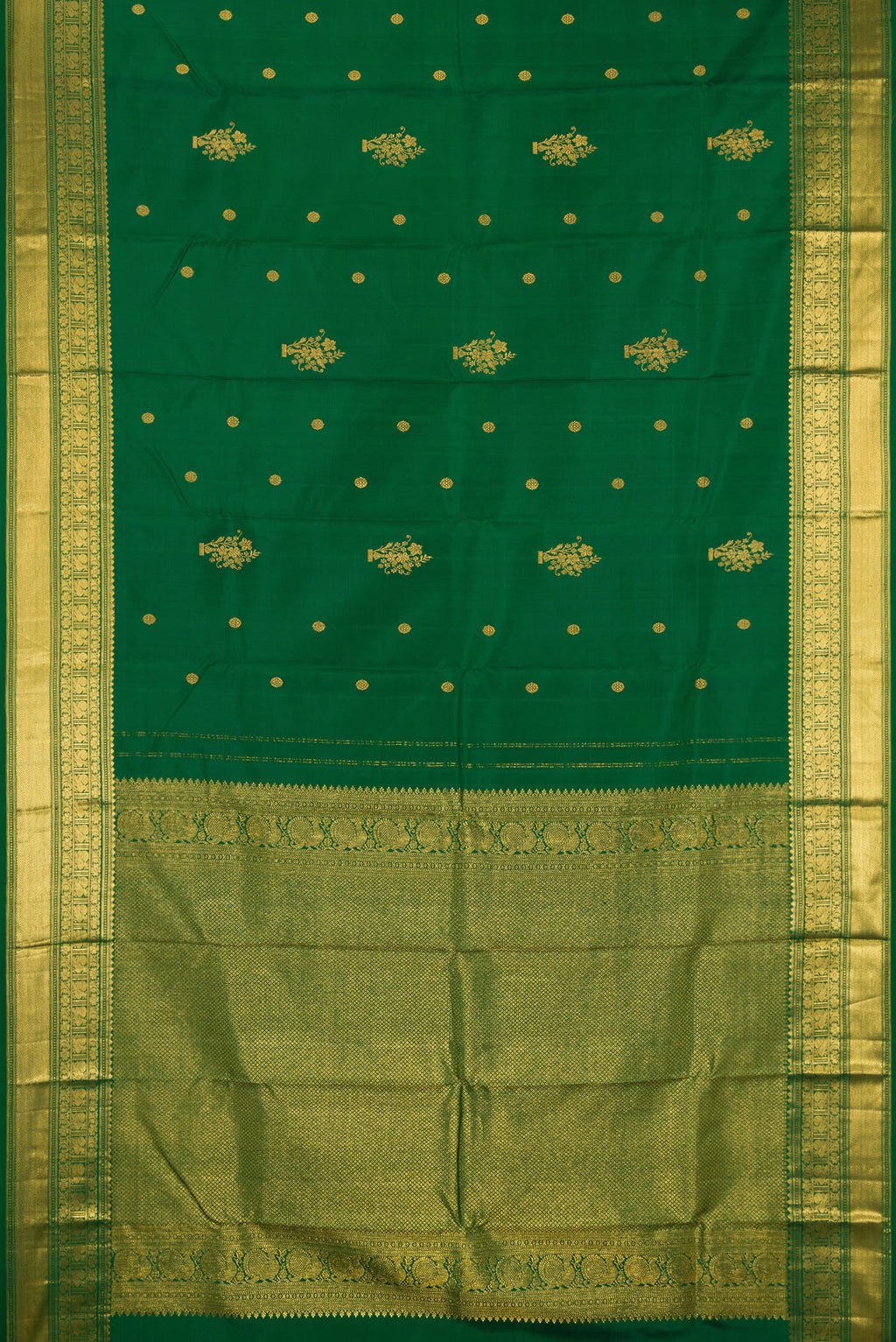 Flat view of Bottle Green Kanchipuram Silk Saree with Zari Butta on the body and Fancy Border. 