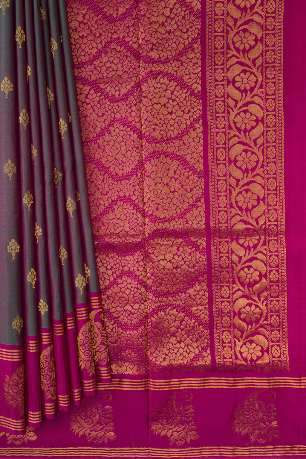 Pleats and pallu of Green Dual Tone Soft Silk Saree with Zari Butta on the body and Fancy Border. 
