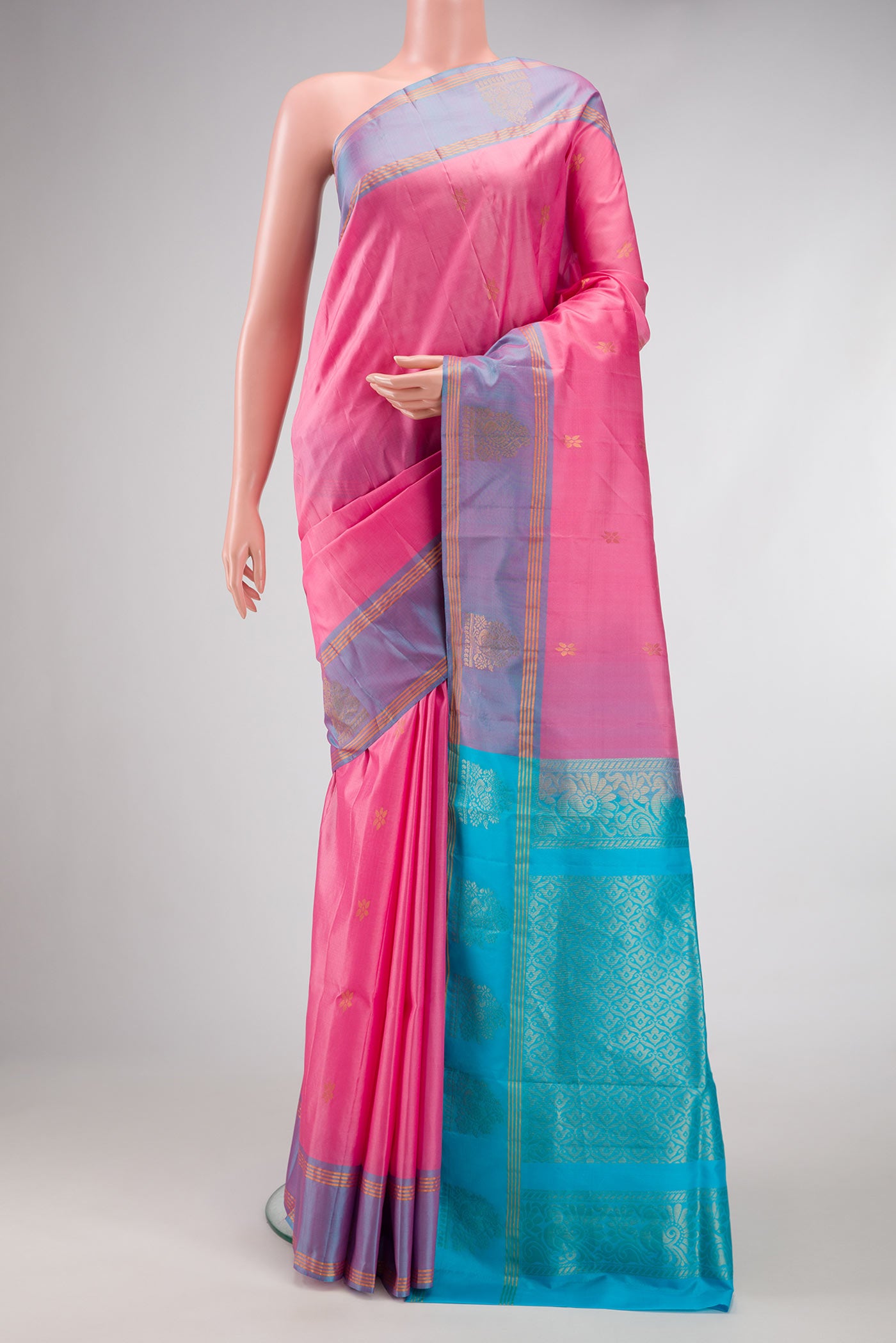 Pink Dual Tone Soft Silk Saree with Zari Butta on the body and Zari Border.  displayed on a mannequin