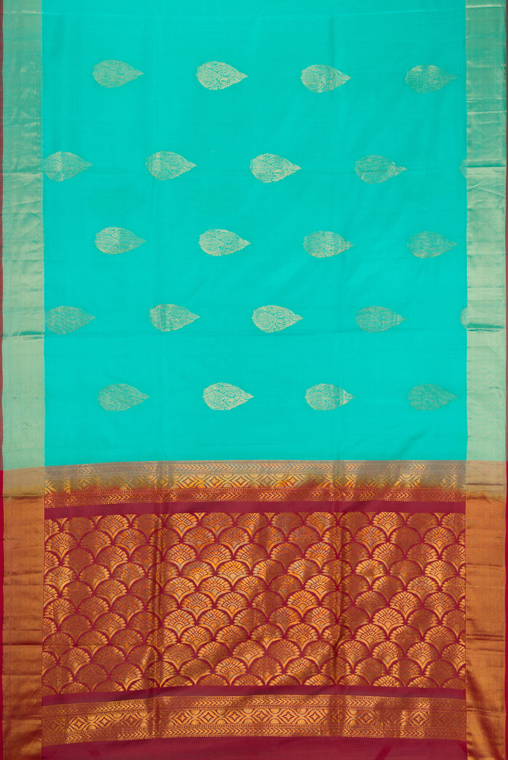Flat view of Sky Blue Soft Silk Saree with Zari Butta on the body and Zari Border. 