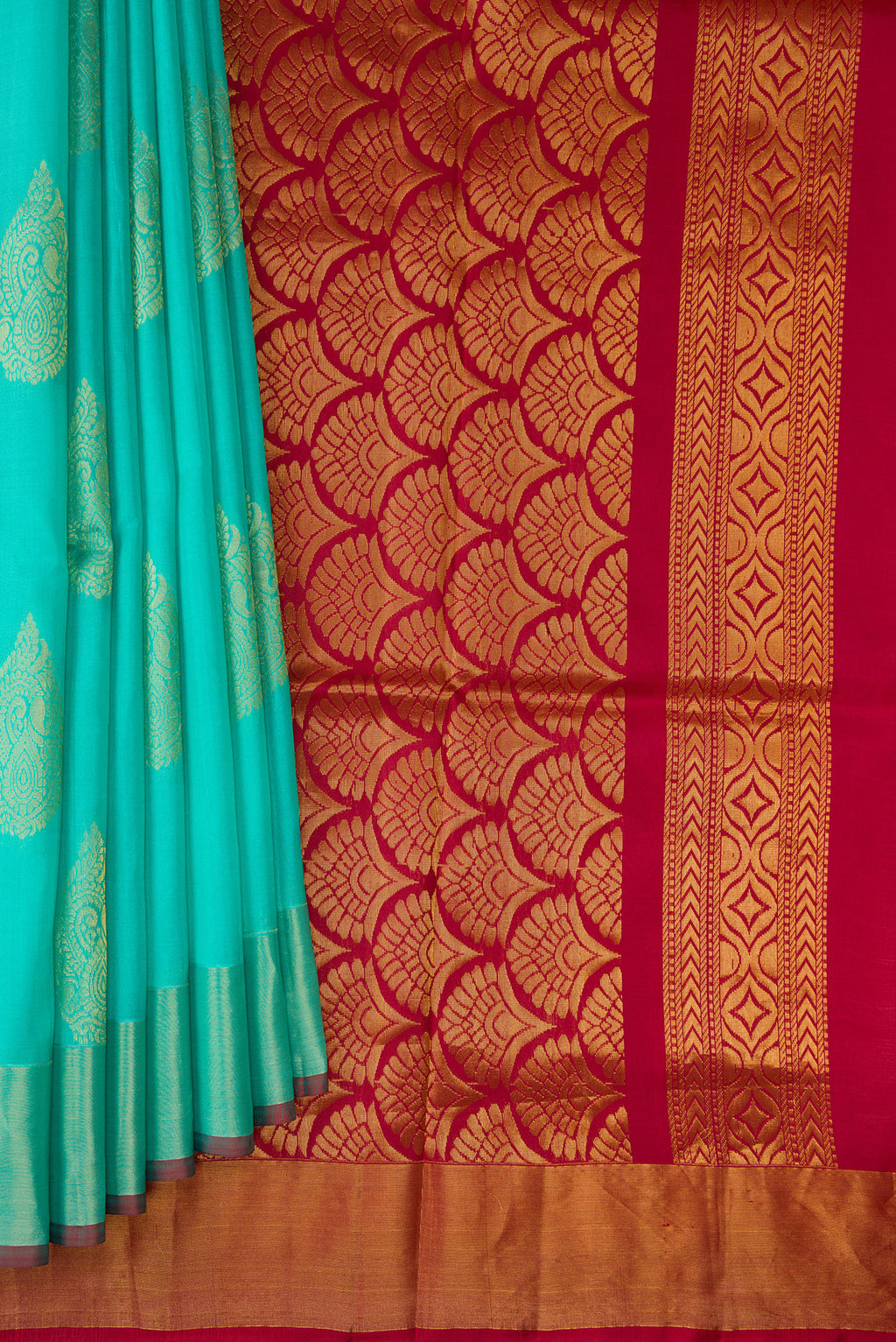 Pleats and pallu of Sky Blue Soft Silk Saree with Zari Butta on the body and Zari Border. 