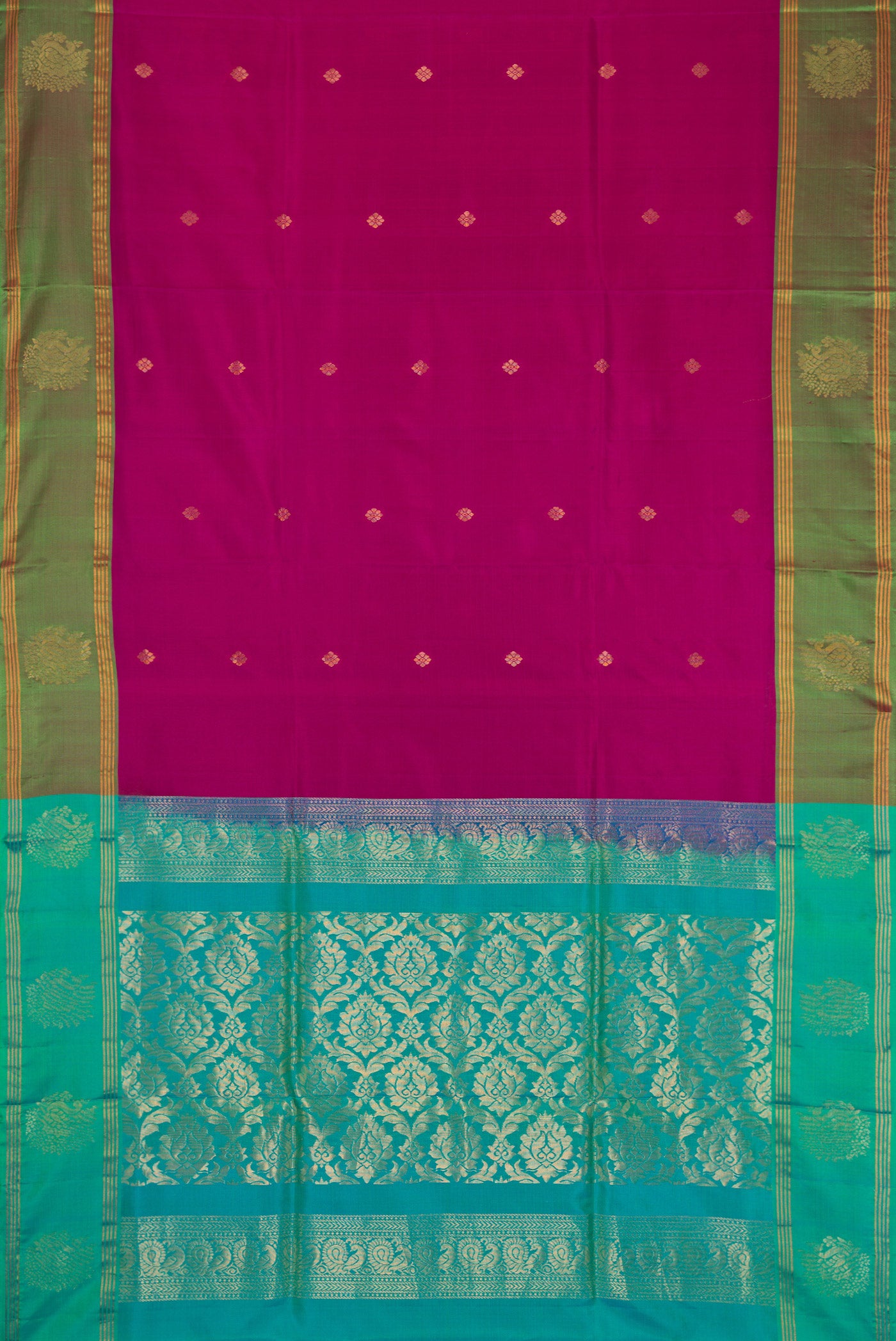 Magenta Dual Tone Soft Silk Saree with Zari Butta on the body and Fancy Border.  displayed on a mannequin