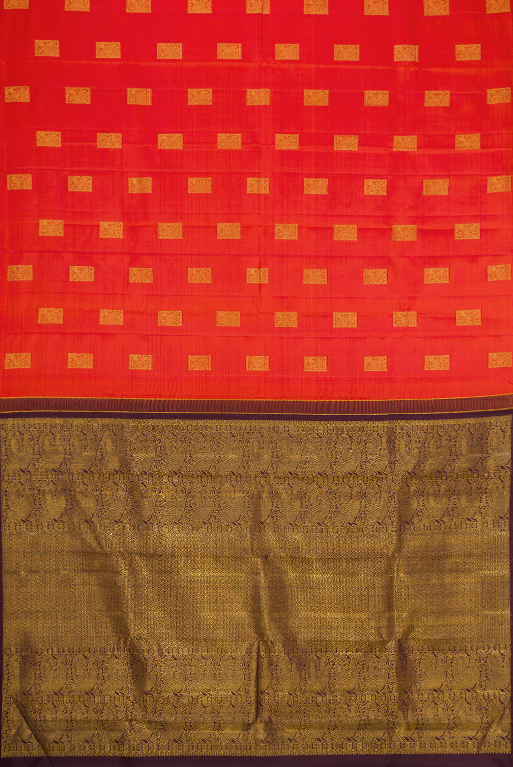 Flat view of Orange Dual Tone Kanchipuram Silk Saree with Zari Butta on the body and Without Border. 
