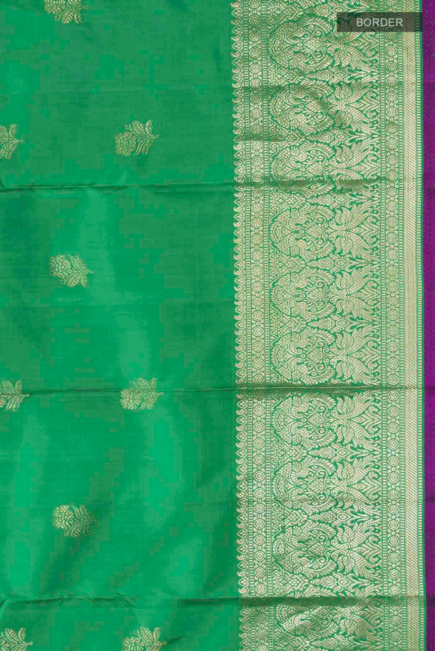 Border image of Green Kanchipuram Silk Saree with Zari Butta on the body and Zari Border