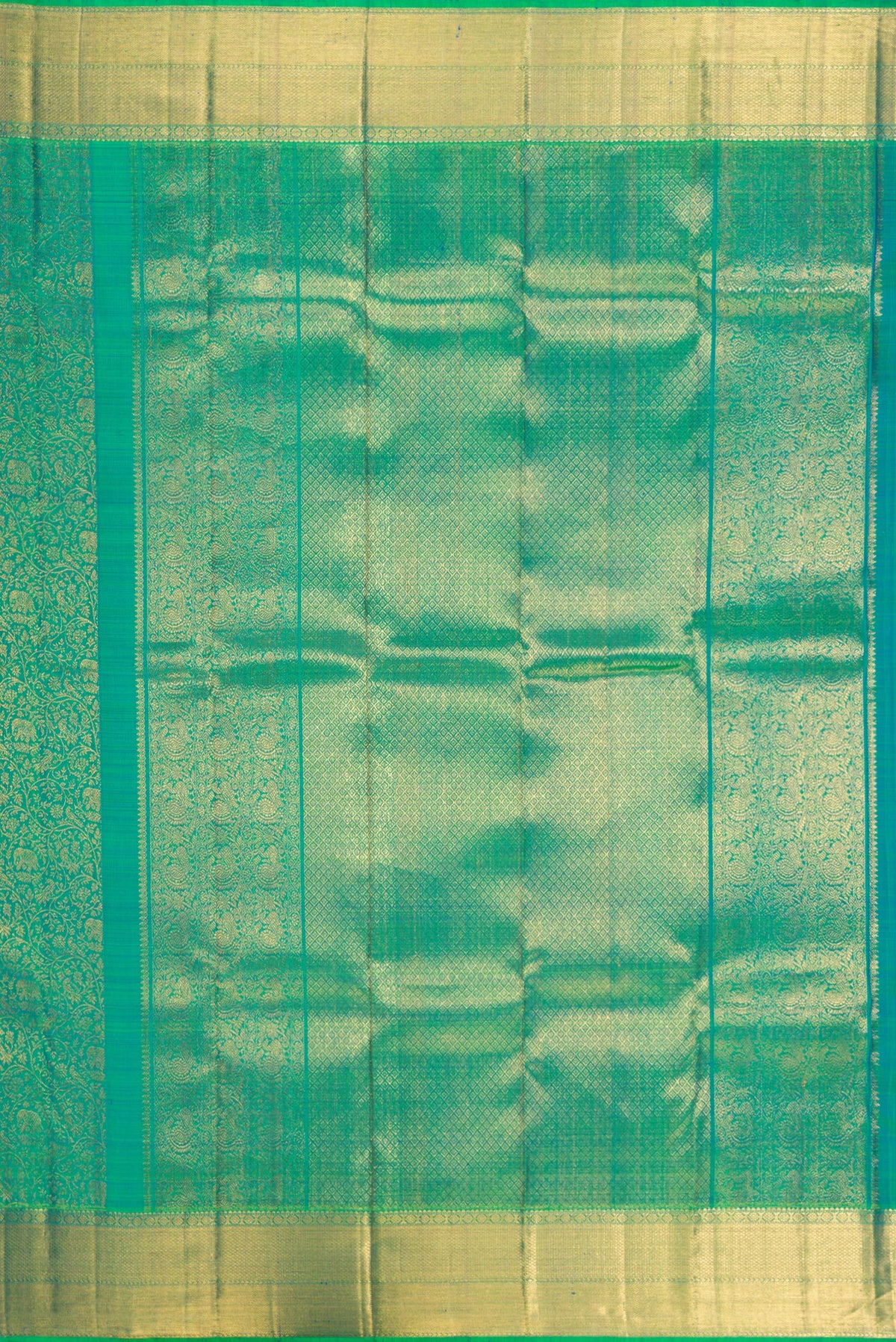 Close up image of the pallu of Green Dual Tone Kanchipuram Silk Saree with Zari Brocade on the body and Zari Border. 