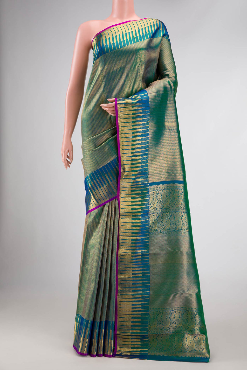Peacock Blue Dual Tone Kanchipuram Silk Saree with Zari Brocade on the body and Zari Border.  displayed on a mannequin