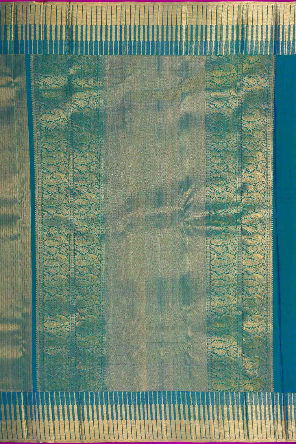 Close up image of the pallu of Peacock Blue Dual Tone Kanchipuram Silk Saree with Zari Brocade on the body and Zari Border. 