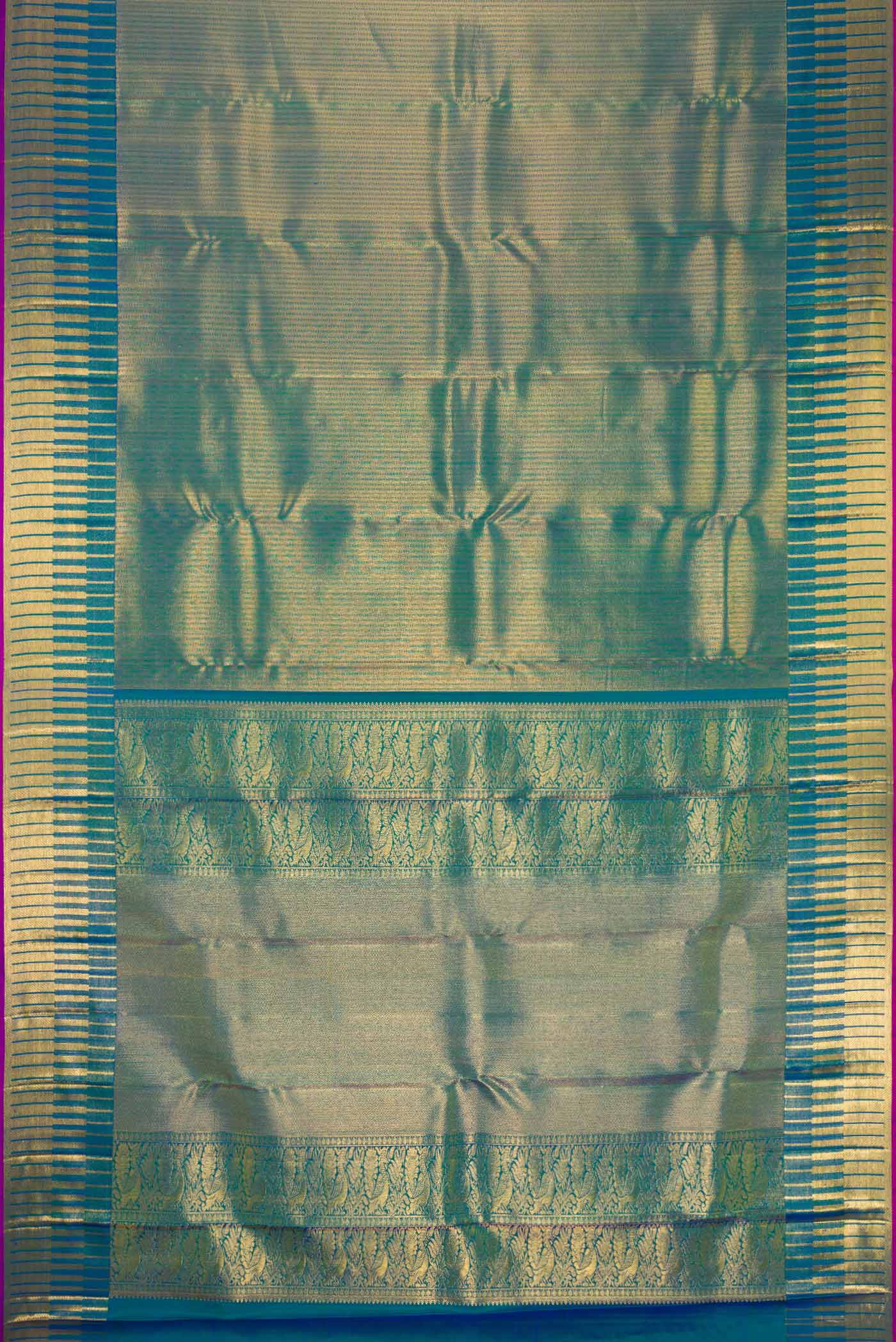 Flat view of Peacock Blue Dual Tone Kanchipuram Silk Saree with Zari Brocade on the body and Zari Border. 