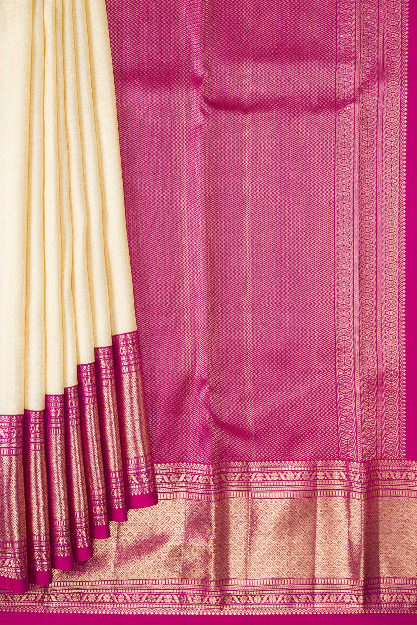 Pleats and pallu of Off White Dual Tone Kanchipuram Silk Saree with Zari Brocade on the body and Zari Border. 