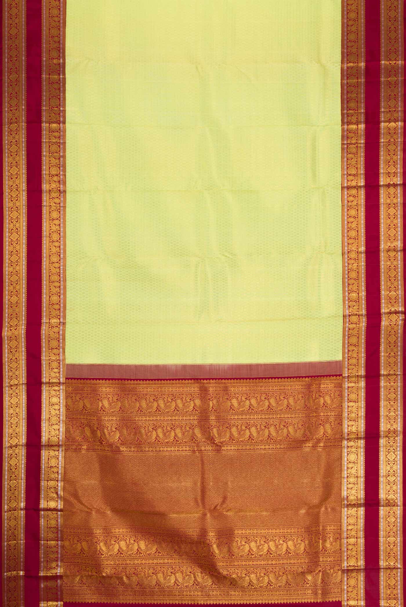 Flat view of Green Kanchipuram Silk Saree with Zari Brocade on the body and Zari Border