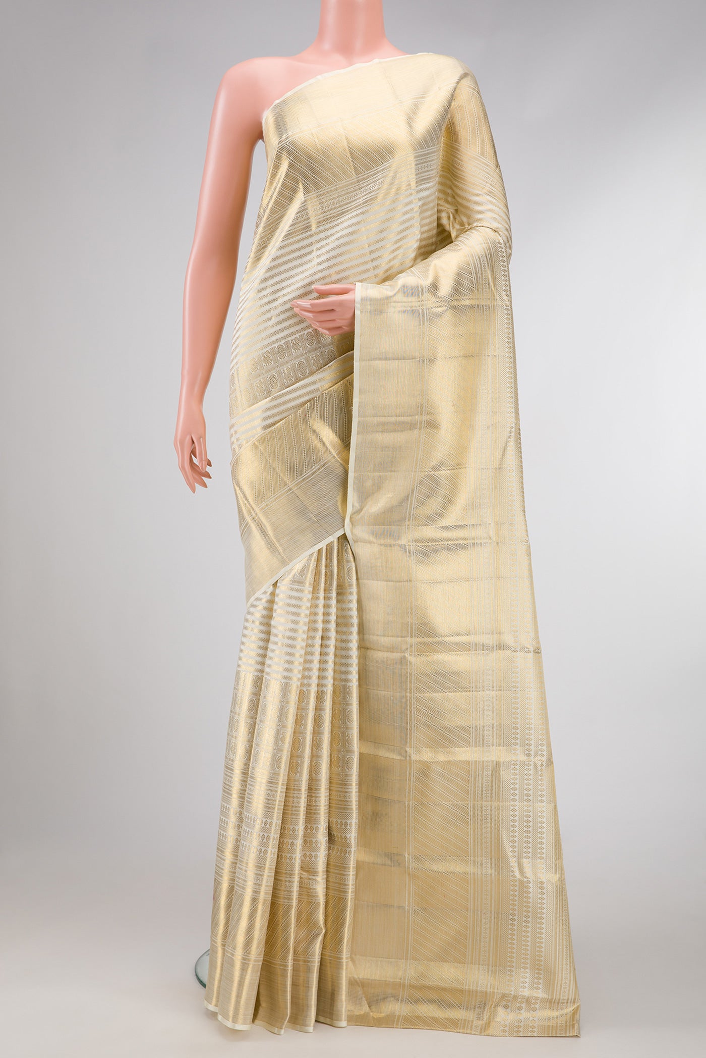 Off White Dual Tone Kanjivaram Silk Saree with Zari Brocade on the body and Zari Border.  displayed on a mannequin