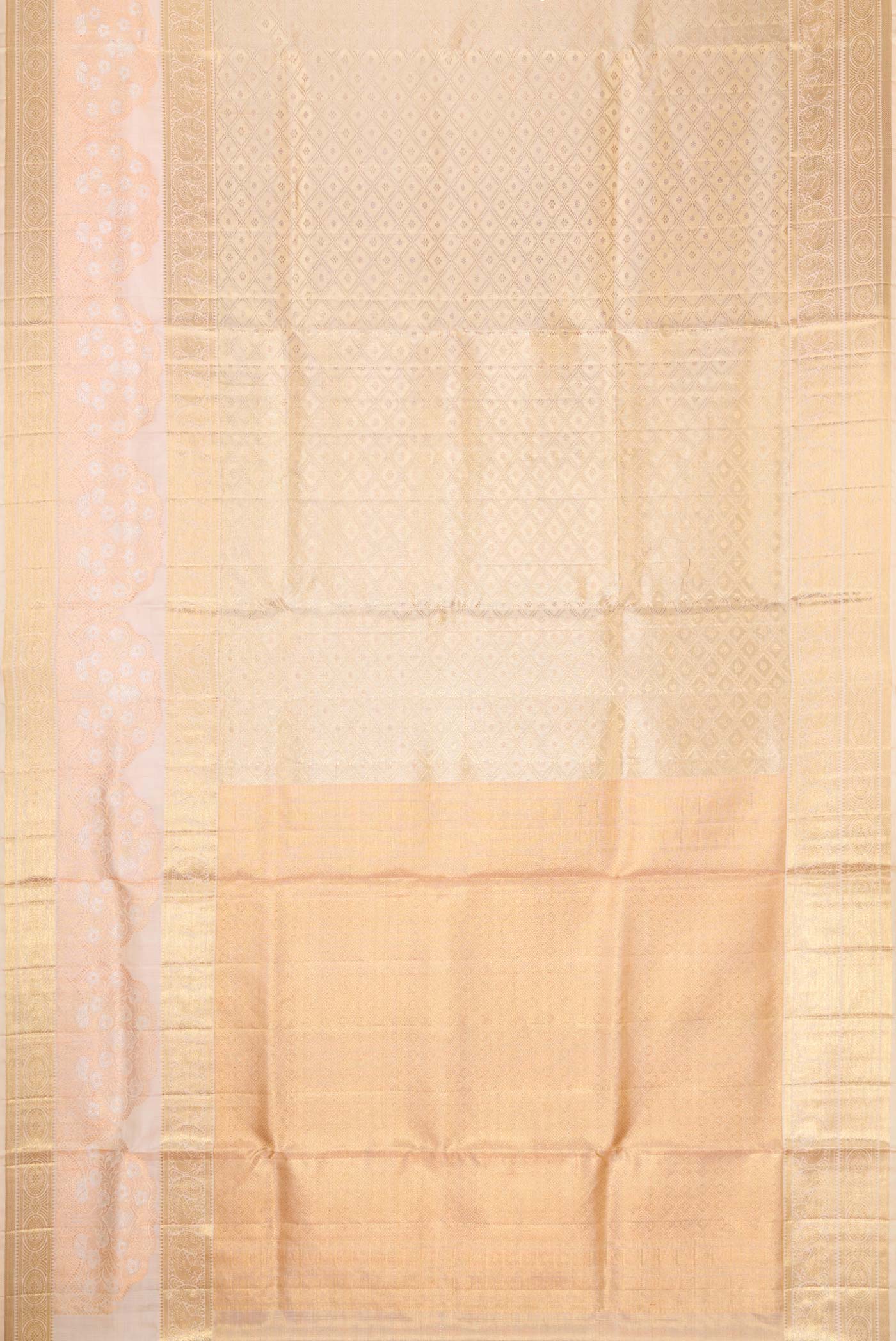 Flat view of Gold Dual Tone Kanjivaram Tissue Silk Saree with Zari Brocade on the body and Fancy Border. 