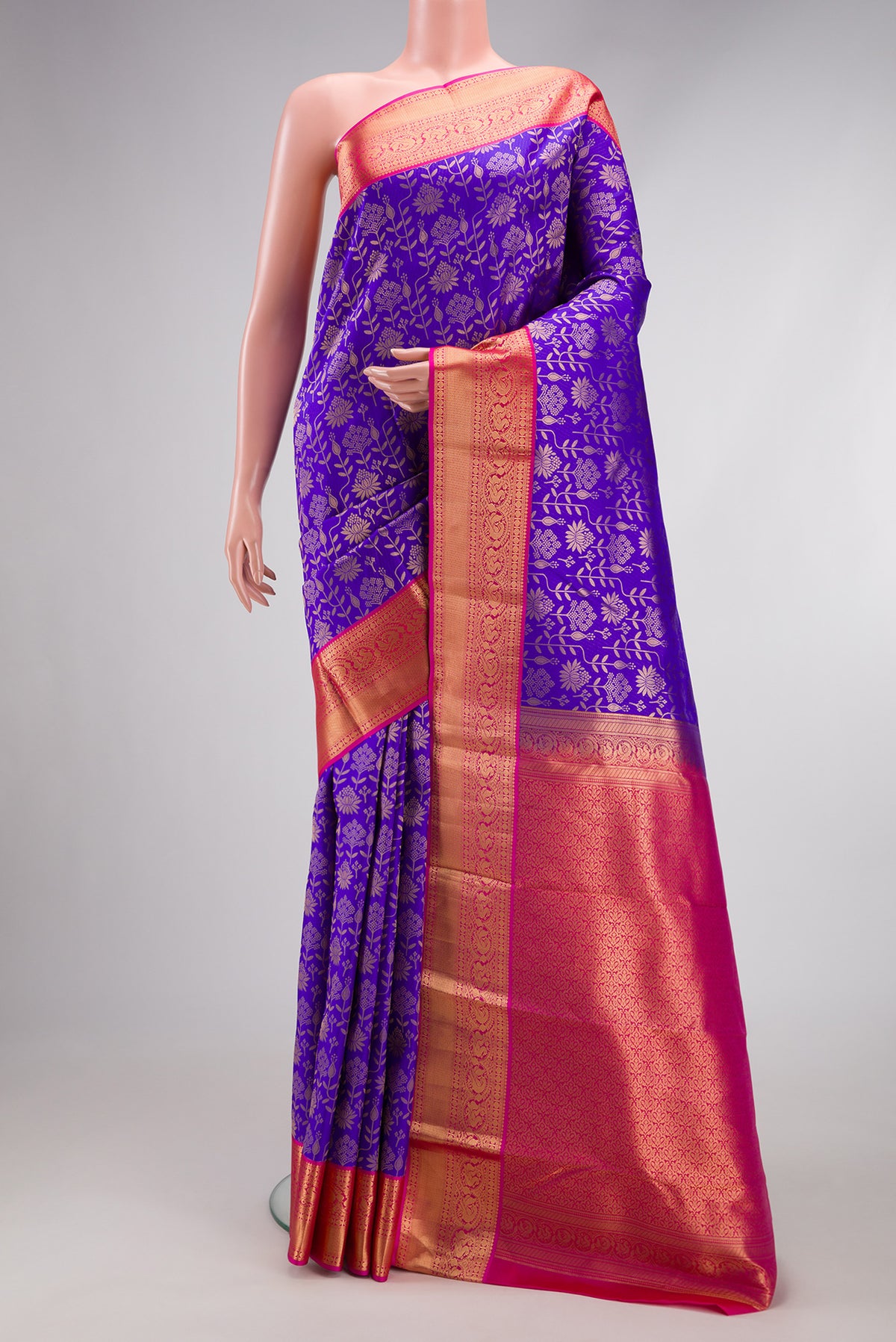 Royal Blue Kanjivaram Silk Saree with Zari Brocade on the body and Zari Border.  displayed on a mannequin