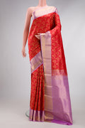 Red Kanjivaram Silk Saree with Zari Brocade on the body and Zari Border.  displayed on a mannequin