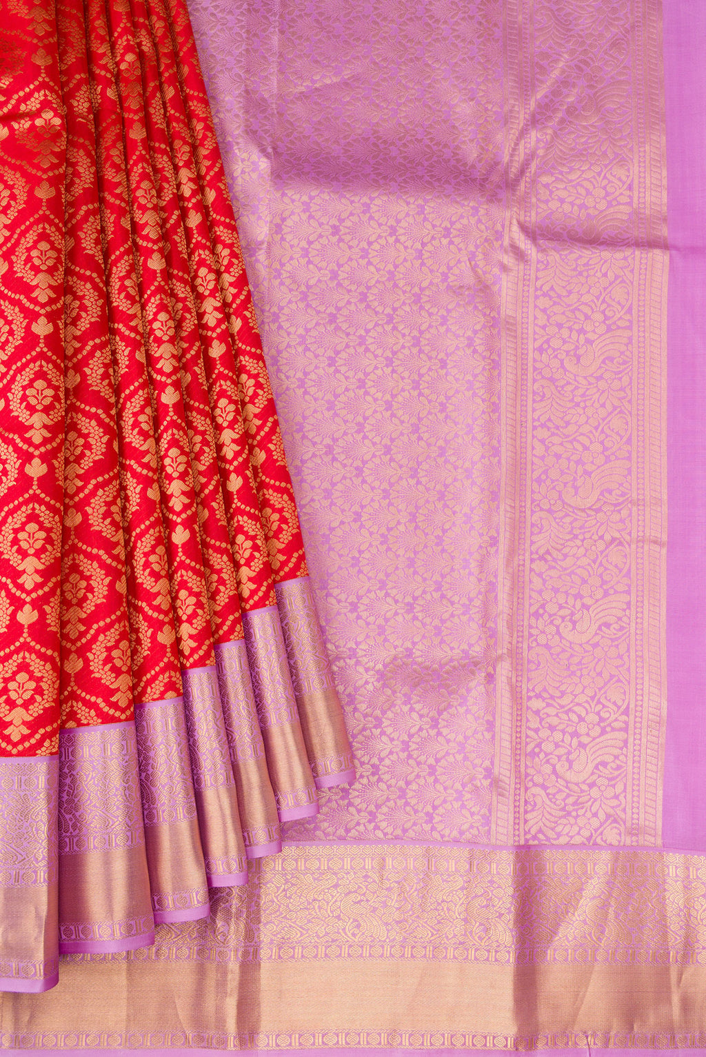 Pleats and pallu of Red Kanjivaram Silk Saree with Zari Brocade on the body and Zari Border. 