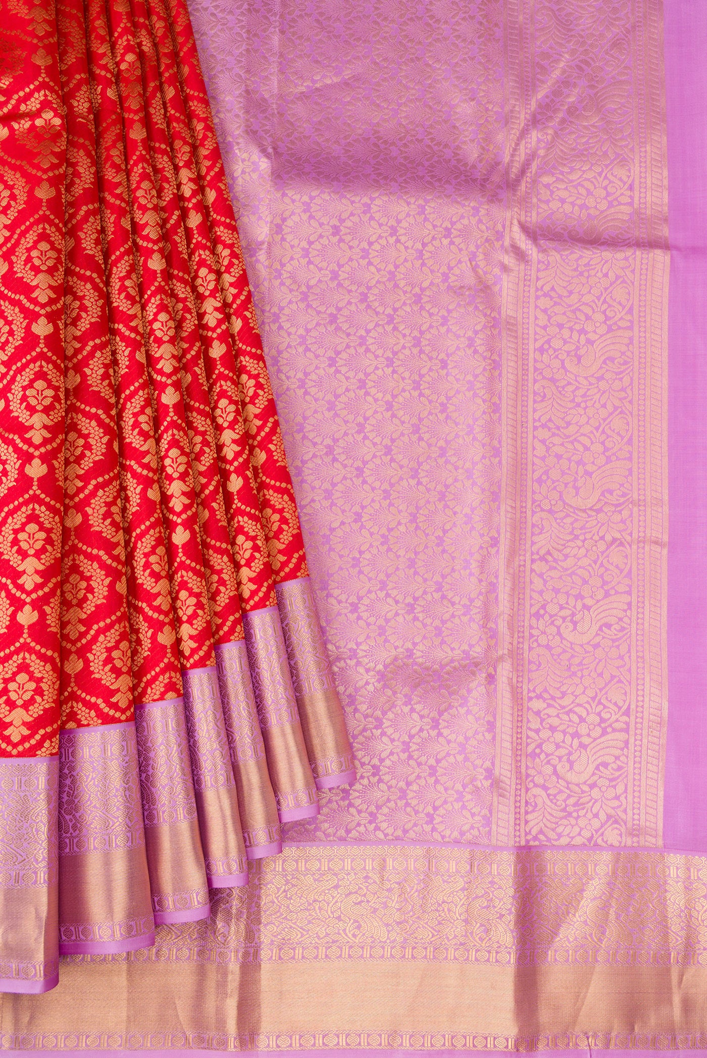 Pleats and pallu of Red Kanjivaram Silk Saree with Zari Brocade on the body and Zari Border. 