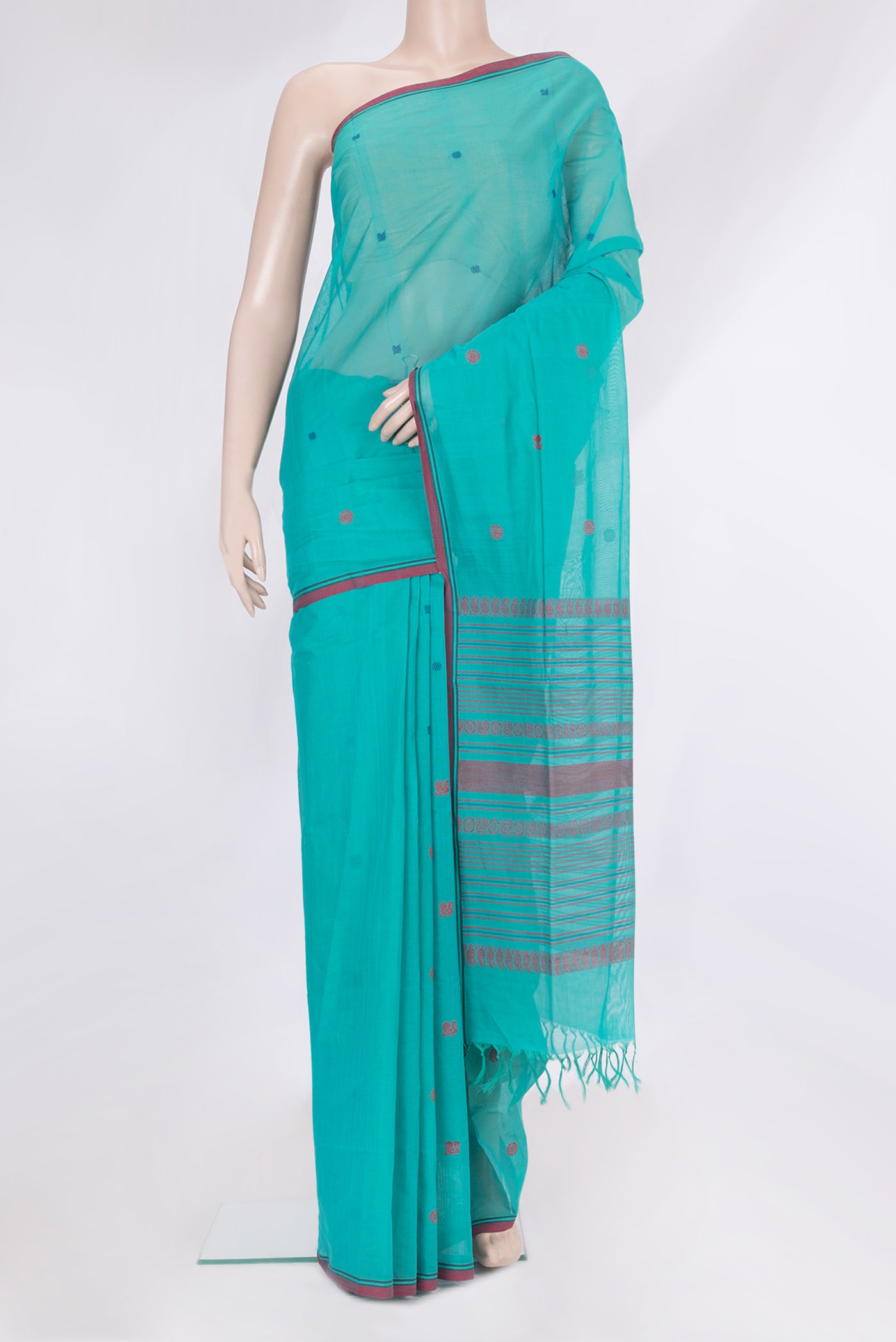 Sky Blue Coimbatore Cotton Saree with Thread Butta on the body and Thread Border.  displayed on a mannequin