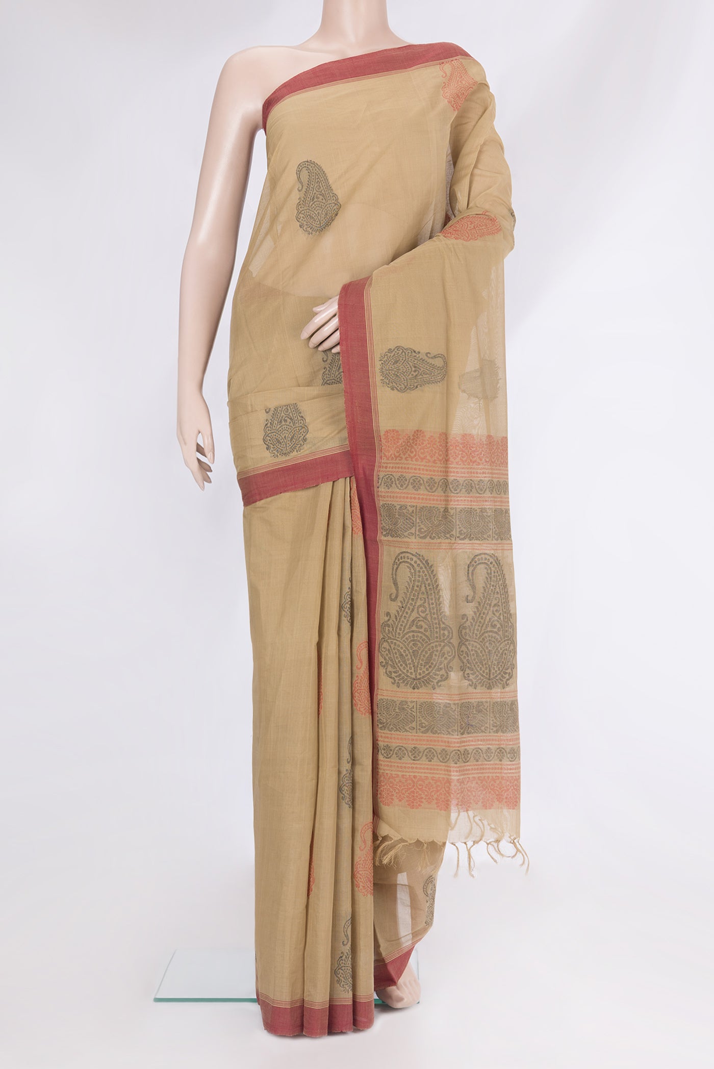 Dark Beige Coimbatore Cotton Saree with Thread Butta on the body and Thread Border.  displayed on a mannequin