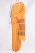 Yellow Coimbatore Cotton Saree with Checked design on the body and Plain Border.  displayed on a mannequin