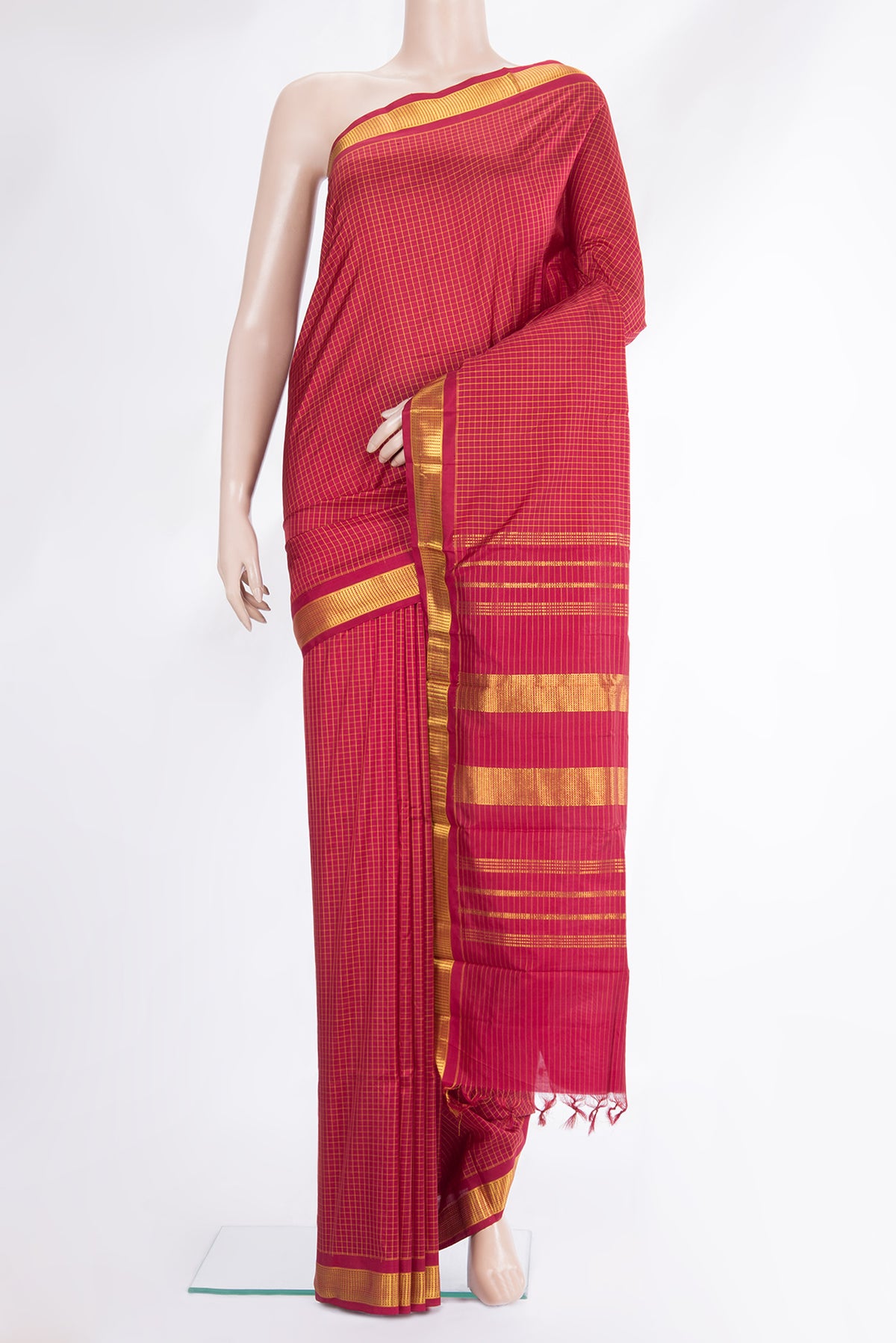 Pure Silk Red Kanchipuram Saree with Checked design on the body and Zari Border.  displayed on a mannequin