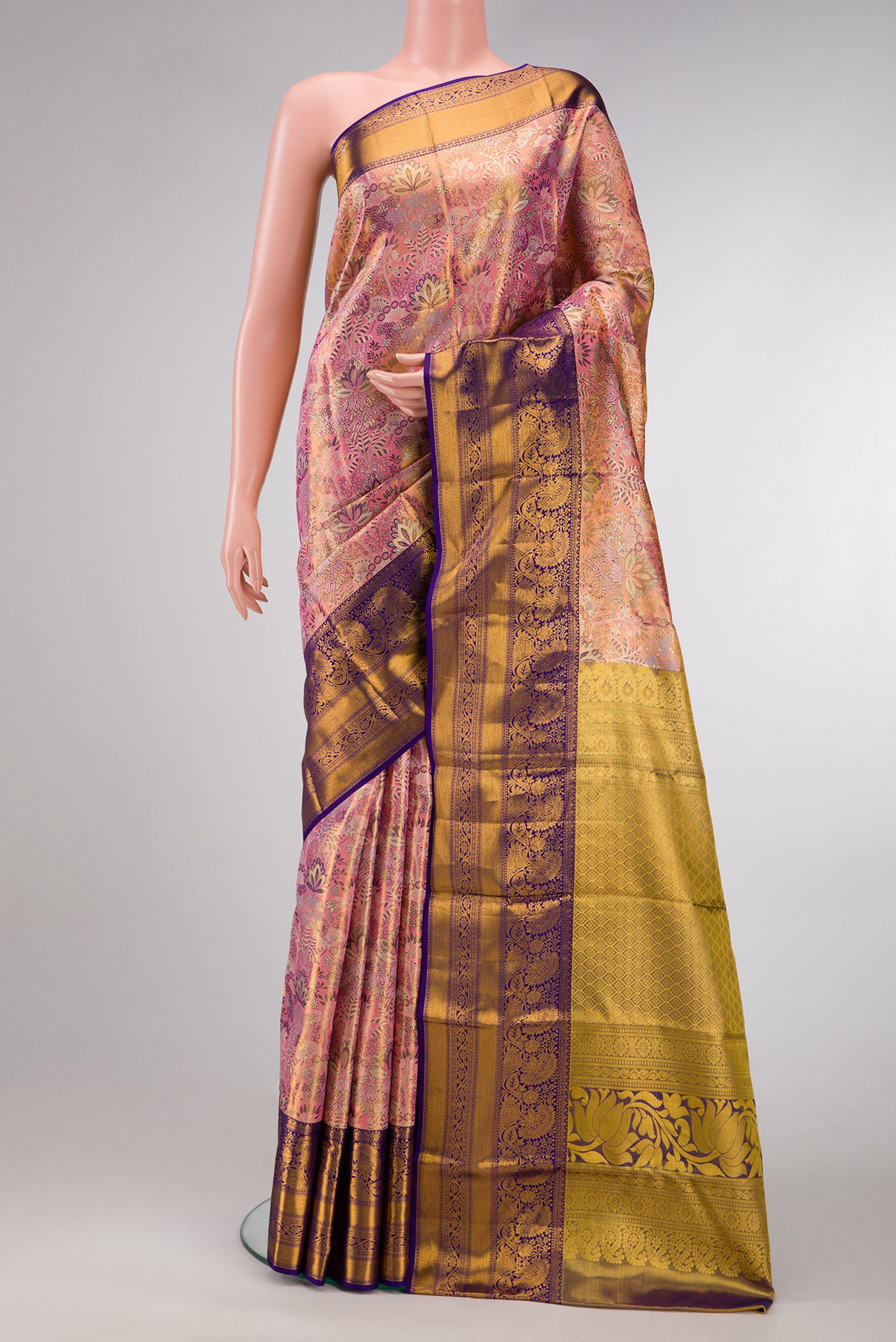 Pink Dual Tone Kanchipuram Tissue Silk Saree with Zari Brocade on the body and Zari Border.  displayed on a mannequin
