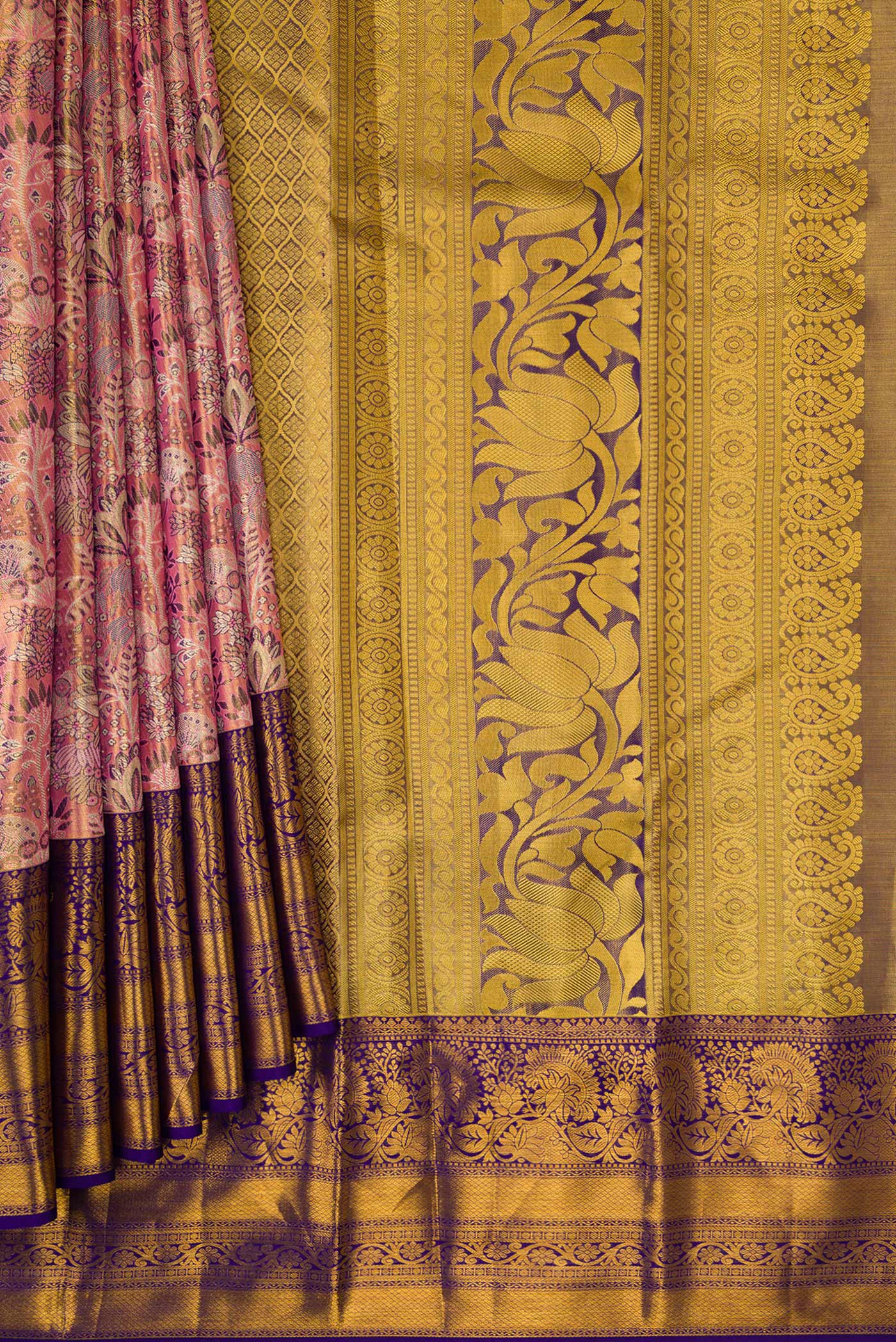 Pleats and pallu of Pink Dual Tone Kanchipuram Tissue Silk Saree with Zari Brocade on the body and Zari Border. 
