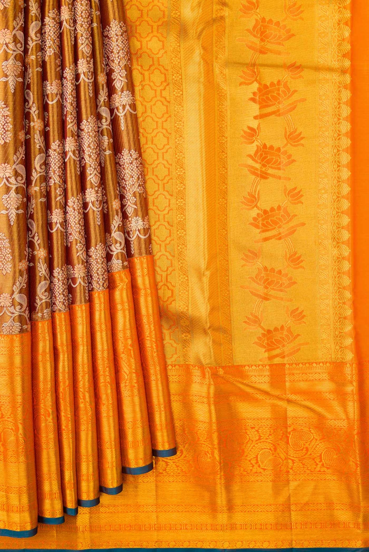 Pleats and pallu of Gold Dual Tone Kanchipuram Tissue Silk Saree with Zari Brocade on the body and Zari Border