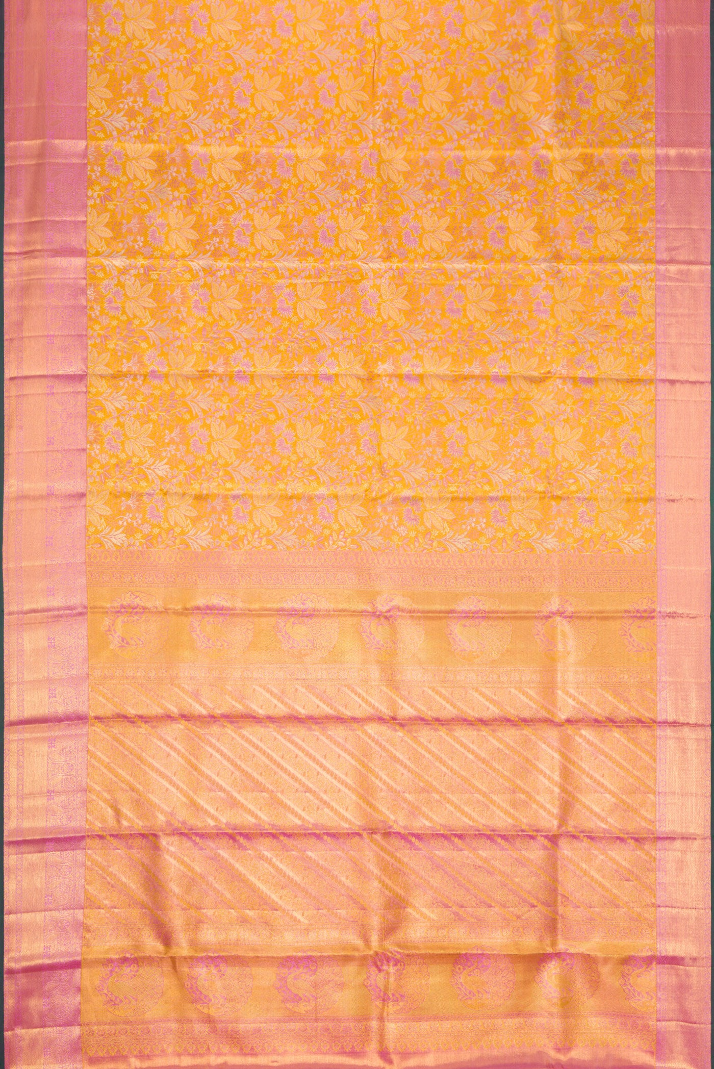 Flat view of Gold Dual Tone Kanchipuram Tissue Silk Saree with Zari Brocade on the body and Zari Border. 