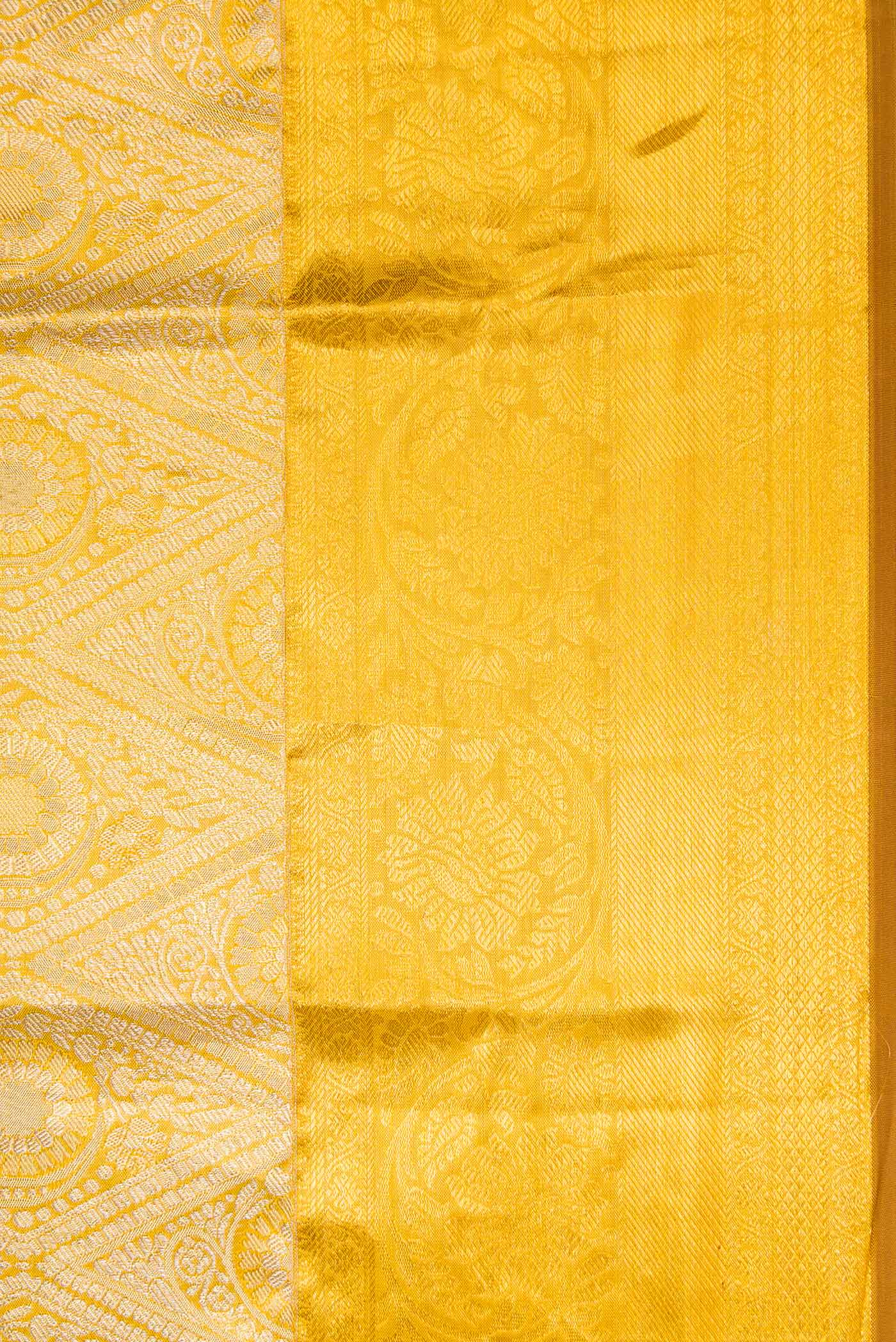 Border image of Gold Dual Tone Kanchipuram Tissue Silk Saree with Zari Brocade on the body and Zari Border. 