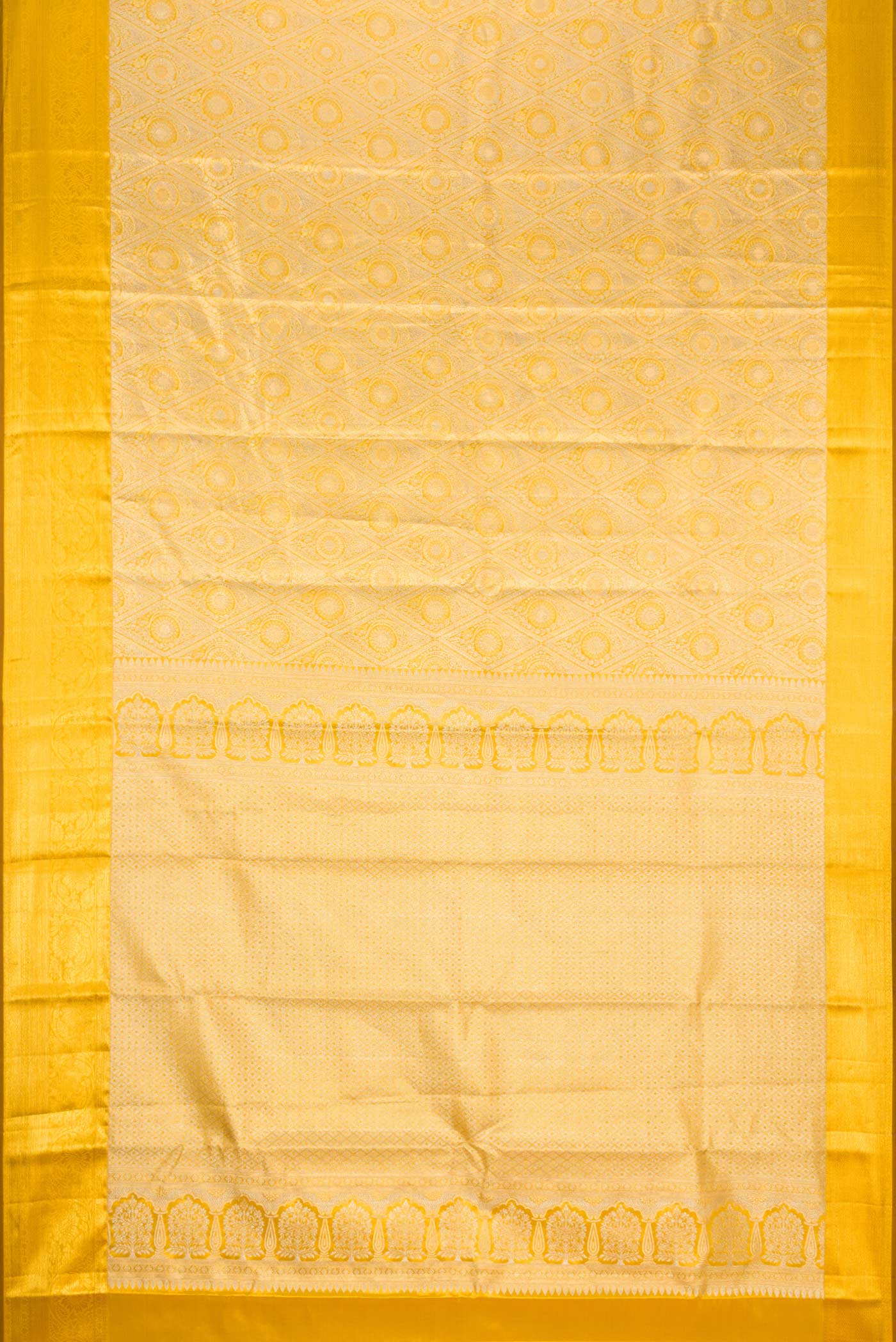 Flat view of Gold Dual Tone Kanchipuram Tissue Silk Saree with Zari Brocade on the body and Zari Border. 