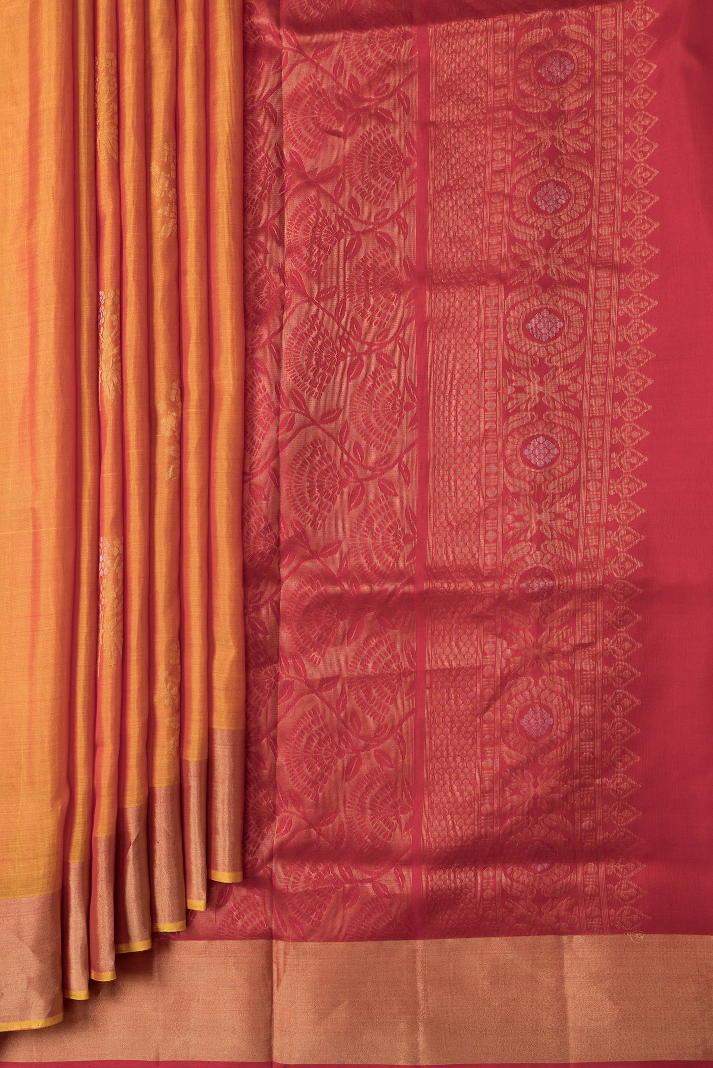 Pleats and pallu of Mustard Dual Tone Soft Silk Saree with Zari Butta on the body and Zari Border. 
