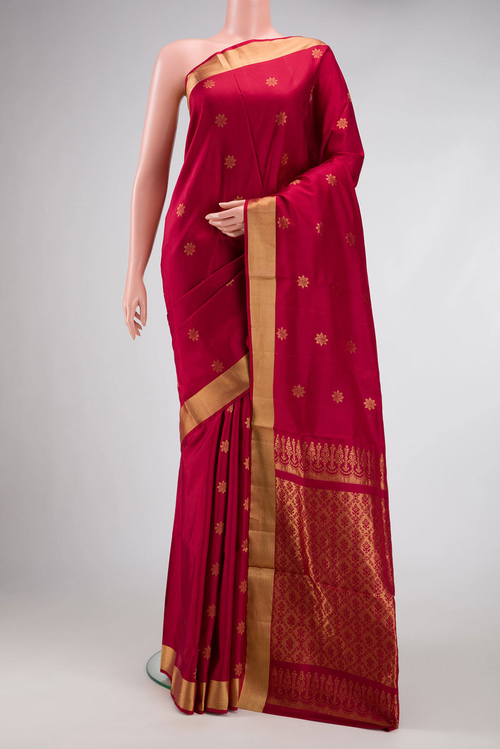 Maroon Dual Tone Soft Silk Saree with Zari Butta on the body and Zari Border.  displayed on a mannequin