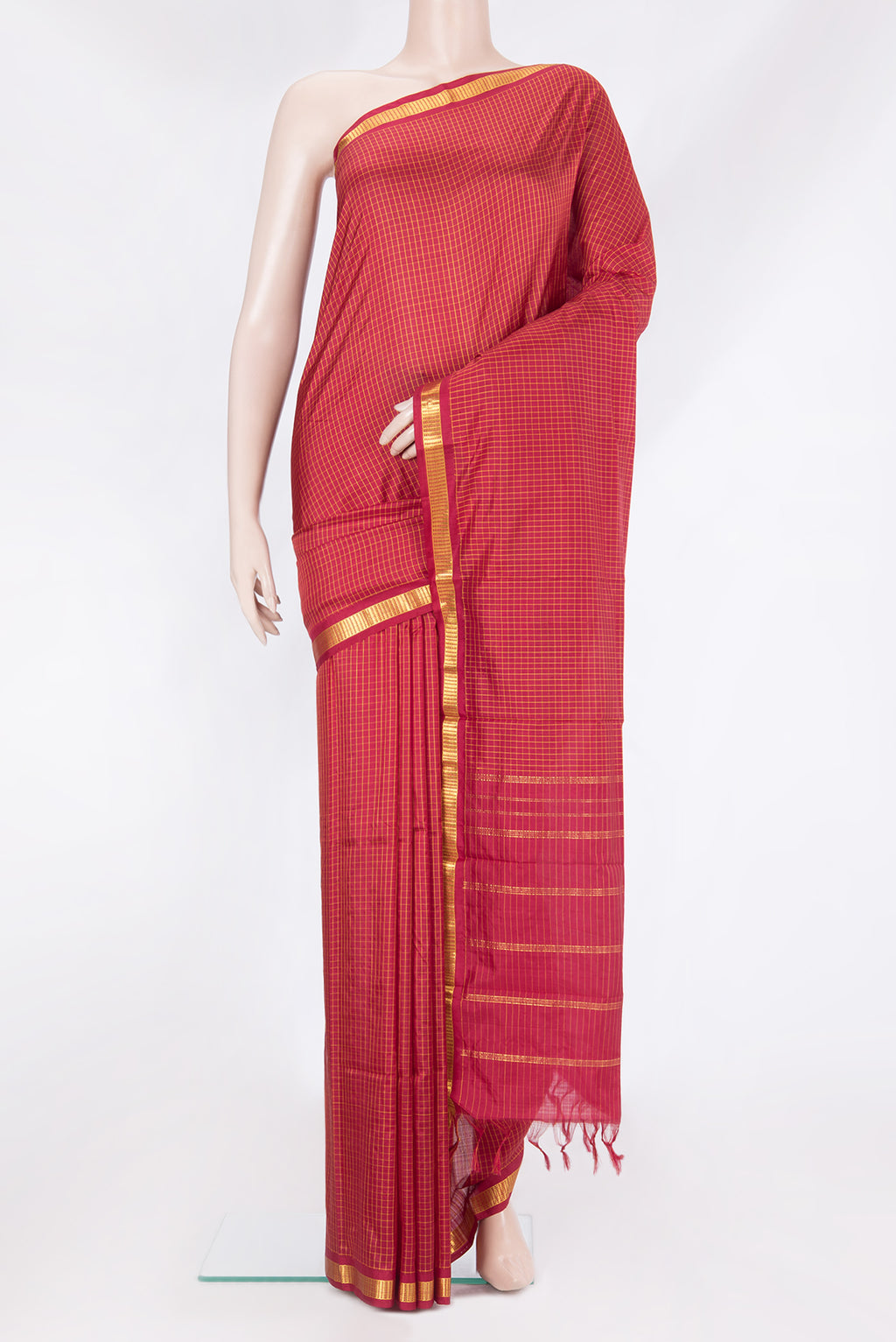 Maroon Kanjivaram Silk Saree with Checked design on the body and Zari Border.  displayed on a mannequin