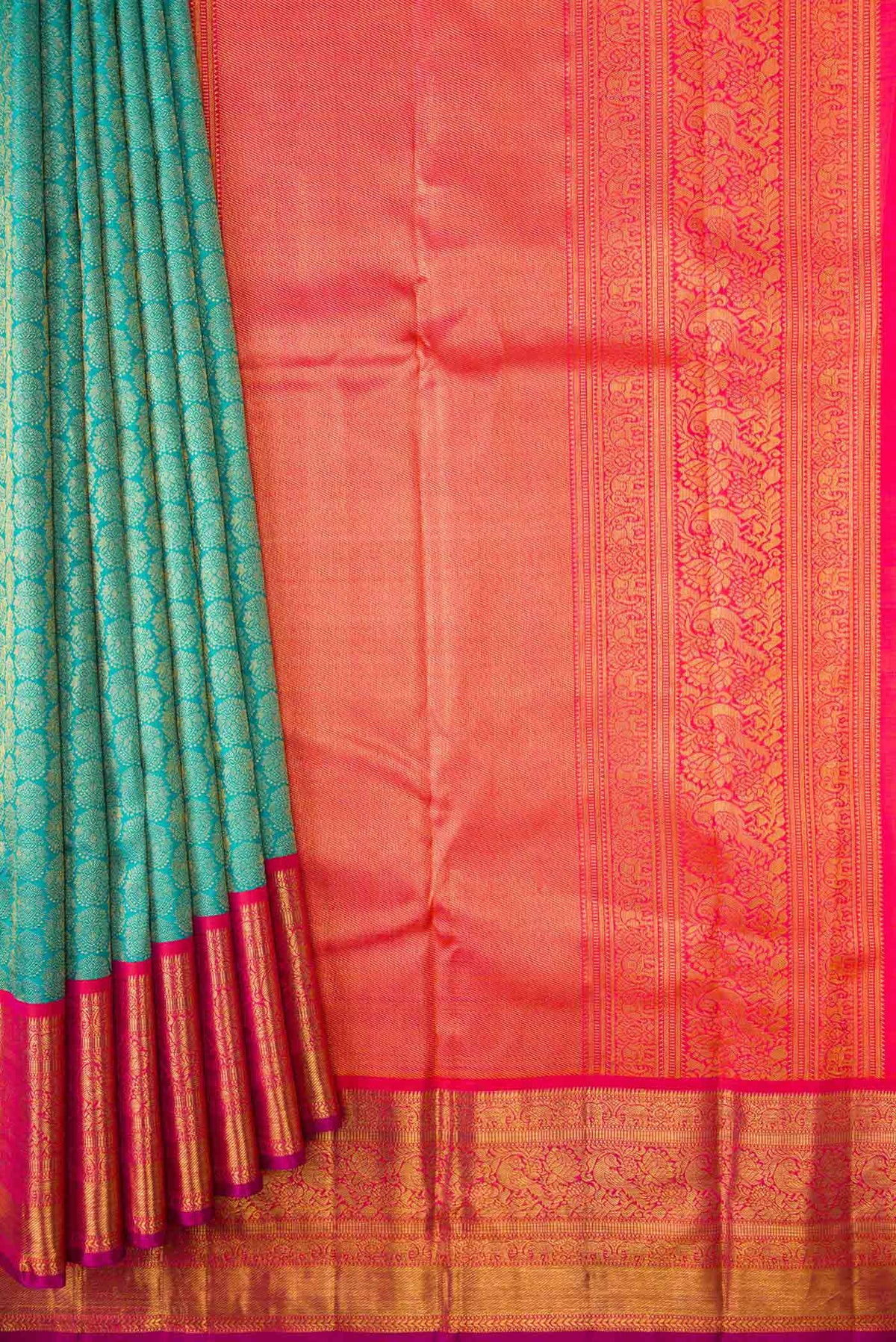 Pleats and pallu of Peacock Blue Dual Tone Kanchipuram Silk Saree with Zari Brocade on the body and Zari Border